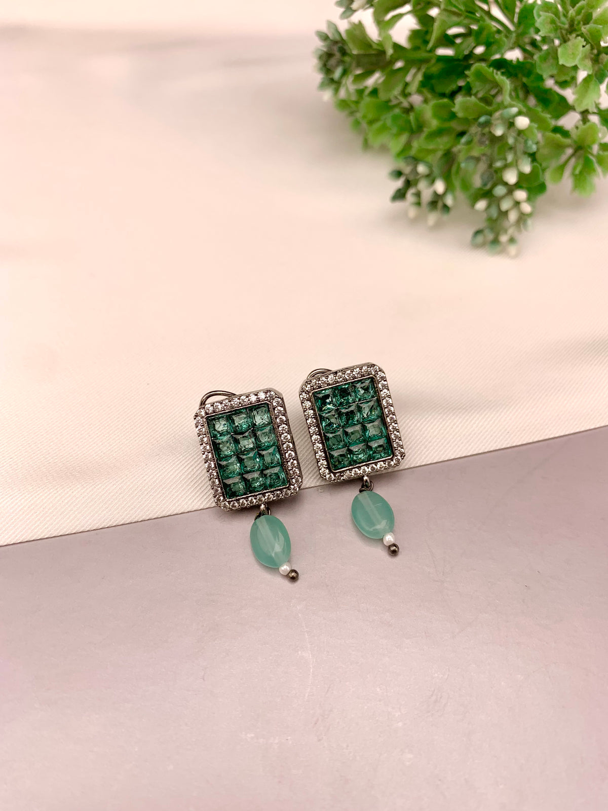 Ameena handcrafted earrings with American Diamonds and semi-precious crystals, available in Sapphire, Emerald, Mint, Ruby and Ferozi variants