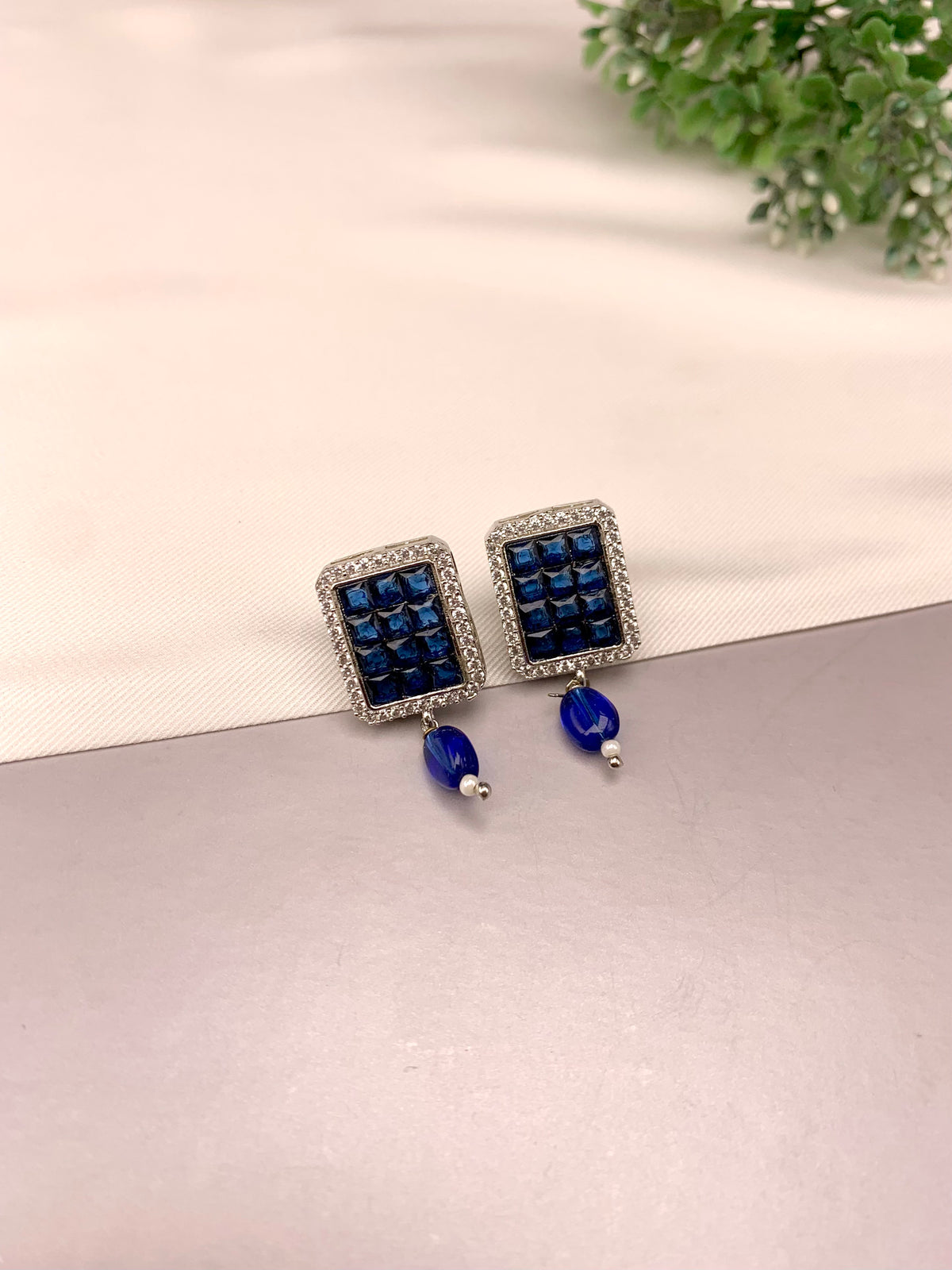 Ameena handcrafted earrings with American Diamonds and semi-precious crystals, available in Sapphire, Emerald, Mint, Ruby and Ferozi variants