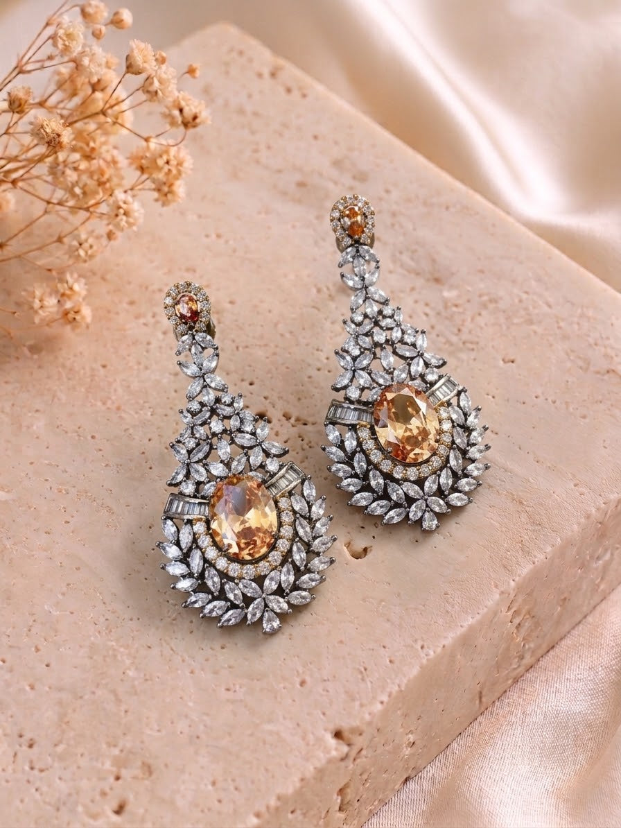 Ameera handcrafted oxidized Rhodium earrings with Victorian diamond finish, American Diamonds and Champagne stones