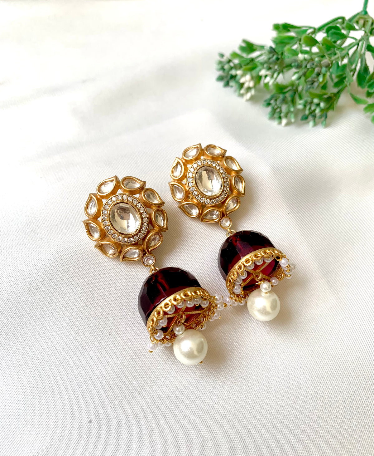 Ameera Ruby Jhumka with Polki Kundan, American Diamonds, Ruby and Pearls in 22kt Gold plating