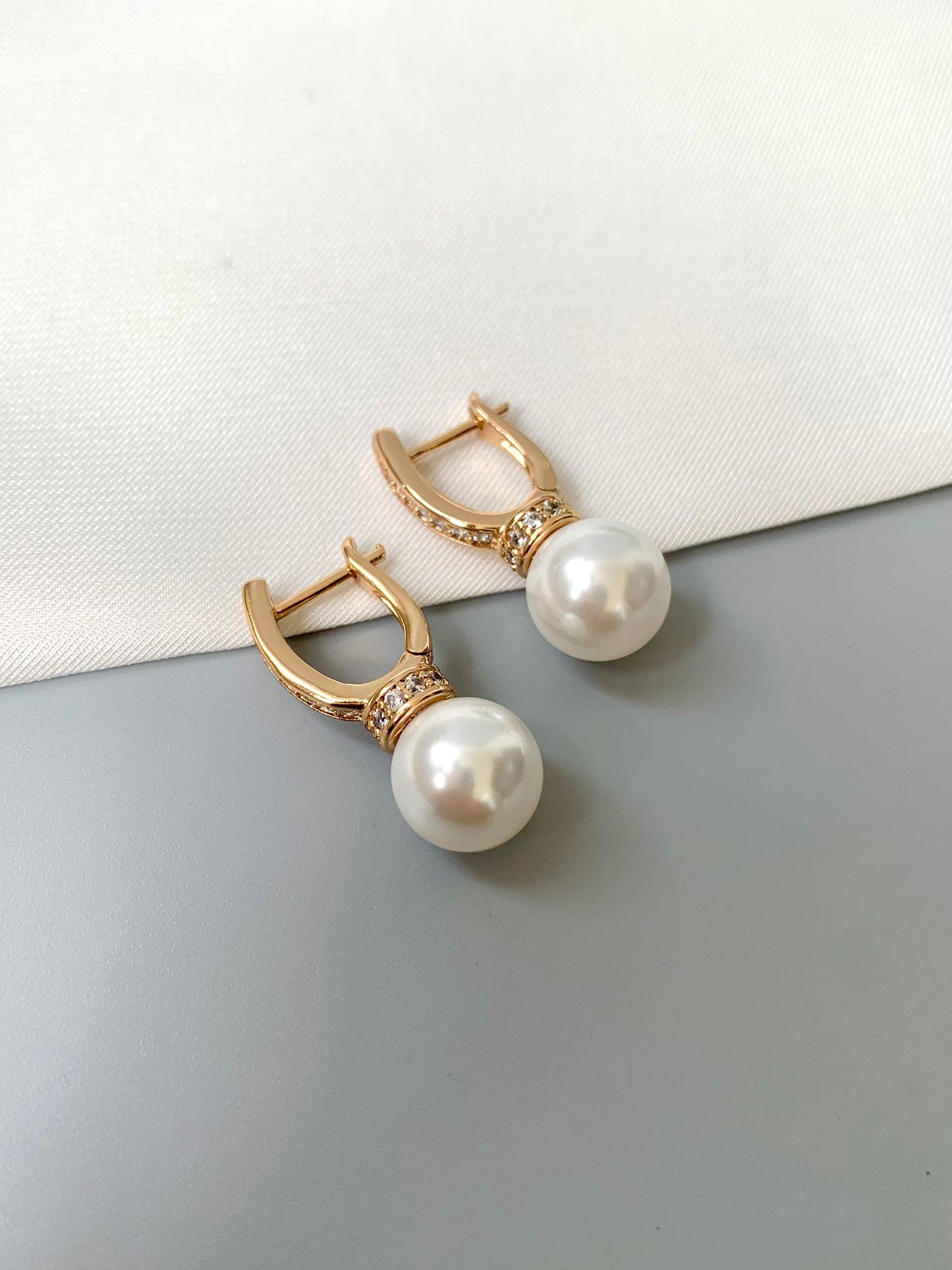 Anania earrings featuring semi-precious pearl and diamond accents