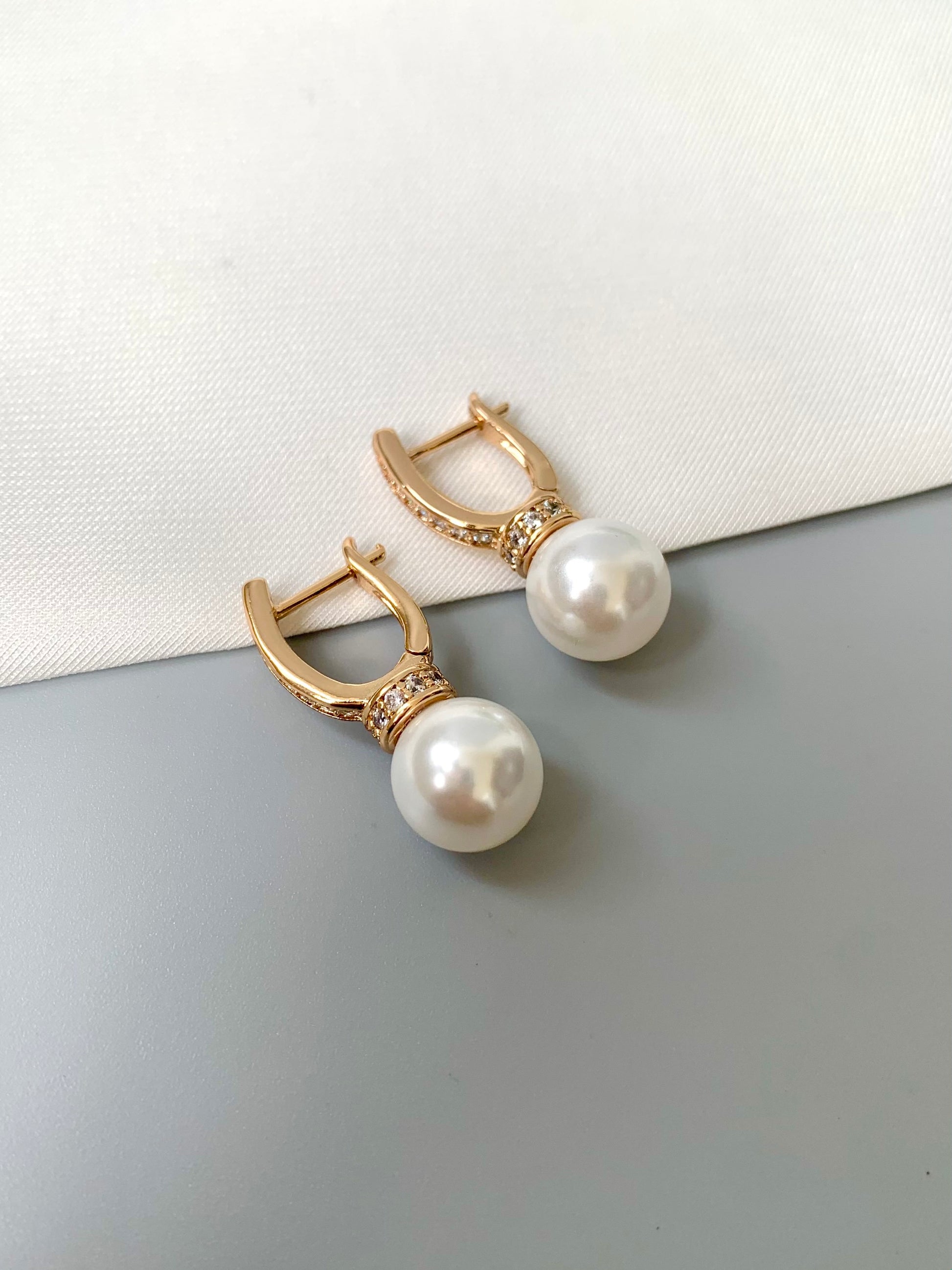 Anania earrings featuring semi-precious pearl and diamond accents