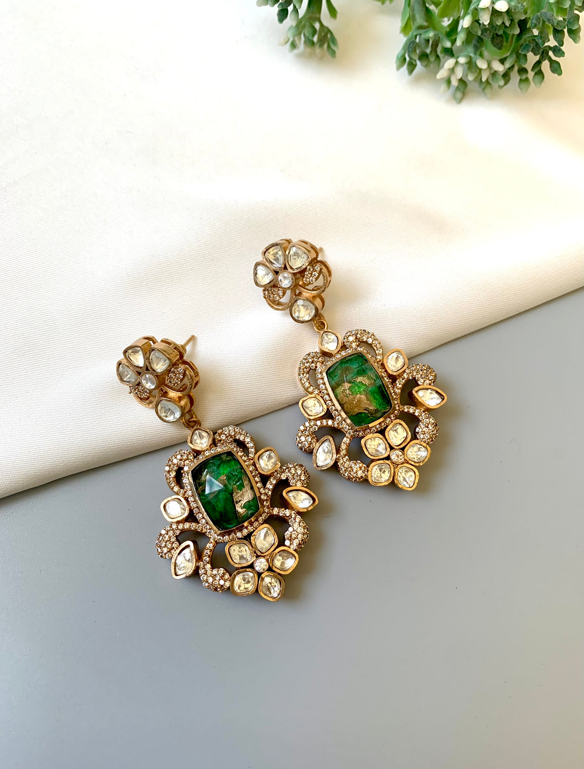 Aneesa handcrafted 22kt Gold oxidized earrings with Polki Diamonds and natural Mosaic Gemstones