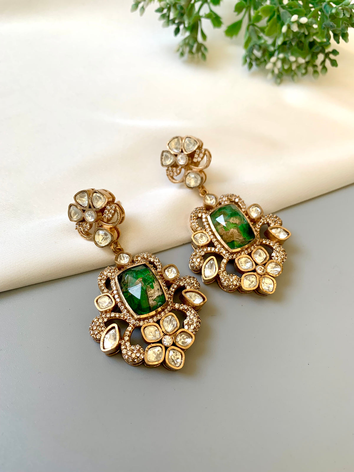 Aneesa handcrafted 22kt Gold oxidized earrings with Polki Diamonds and natural Mosaic Gemstones