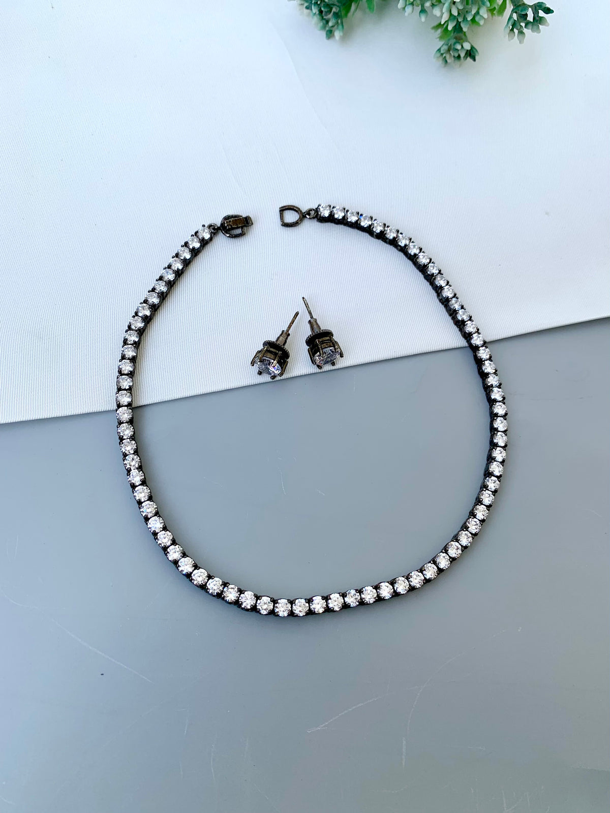 Anisa handcrafted oxidized Rhodium neckline with American Diamonds
