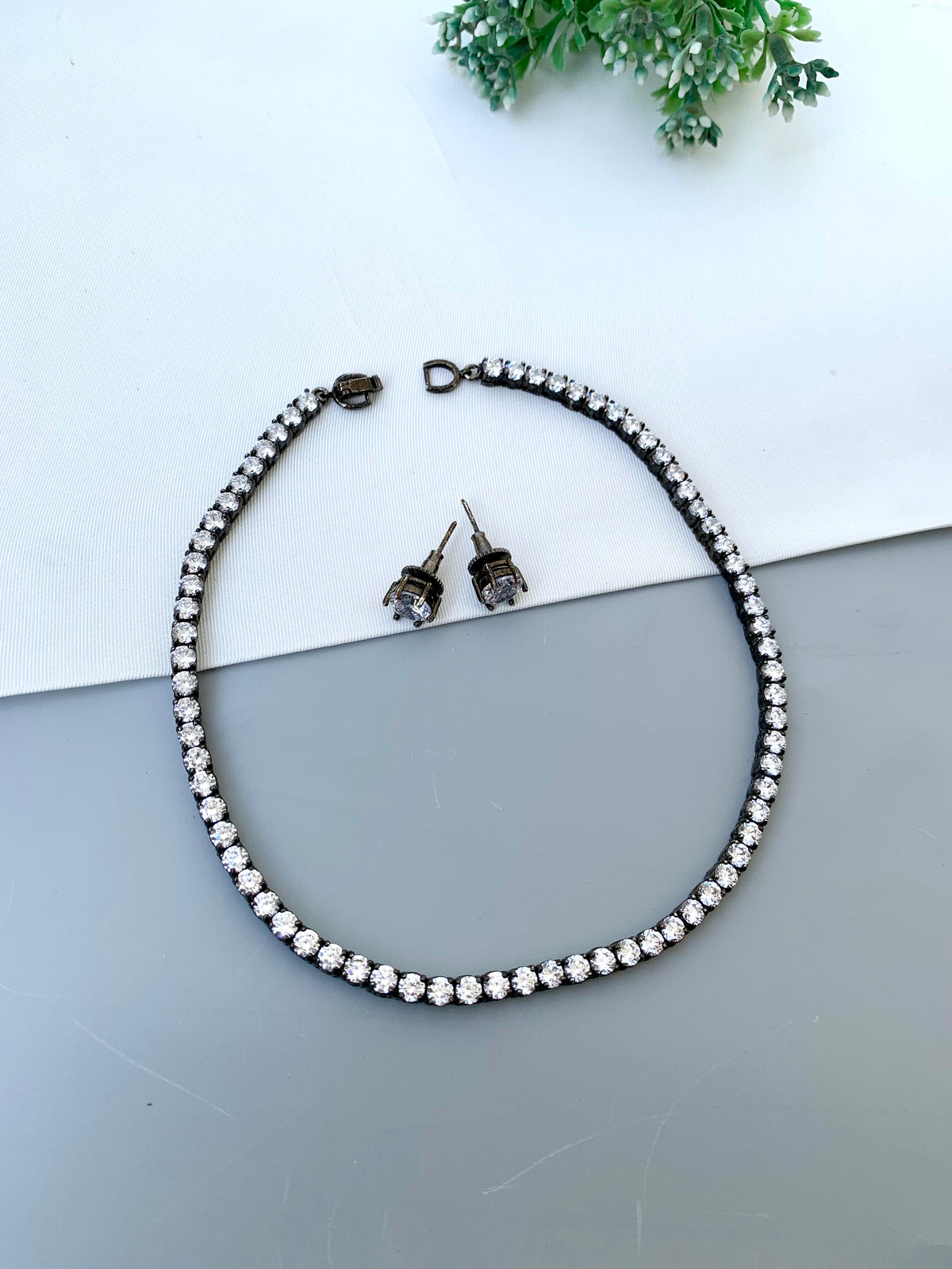 Anisa handcrafted oxidized Rhodium neckline with American Diamonds