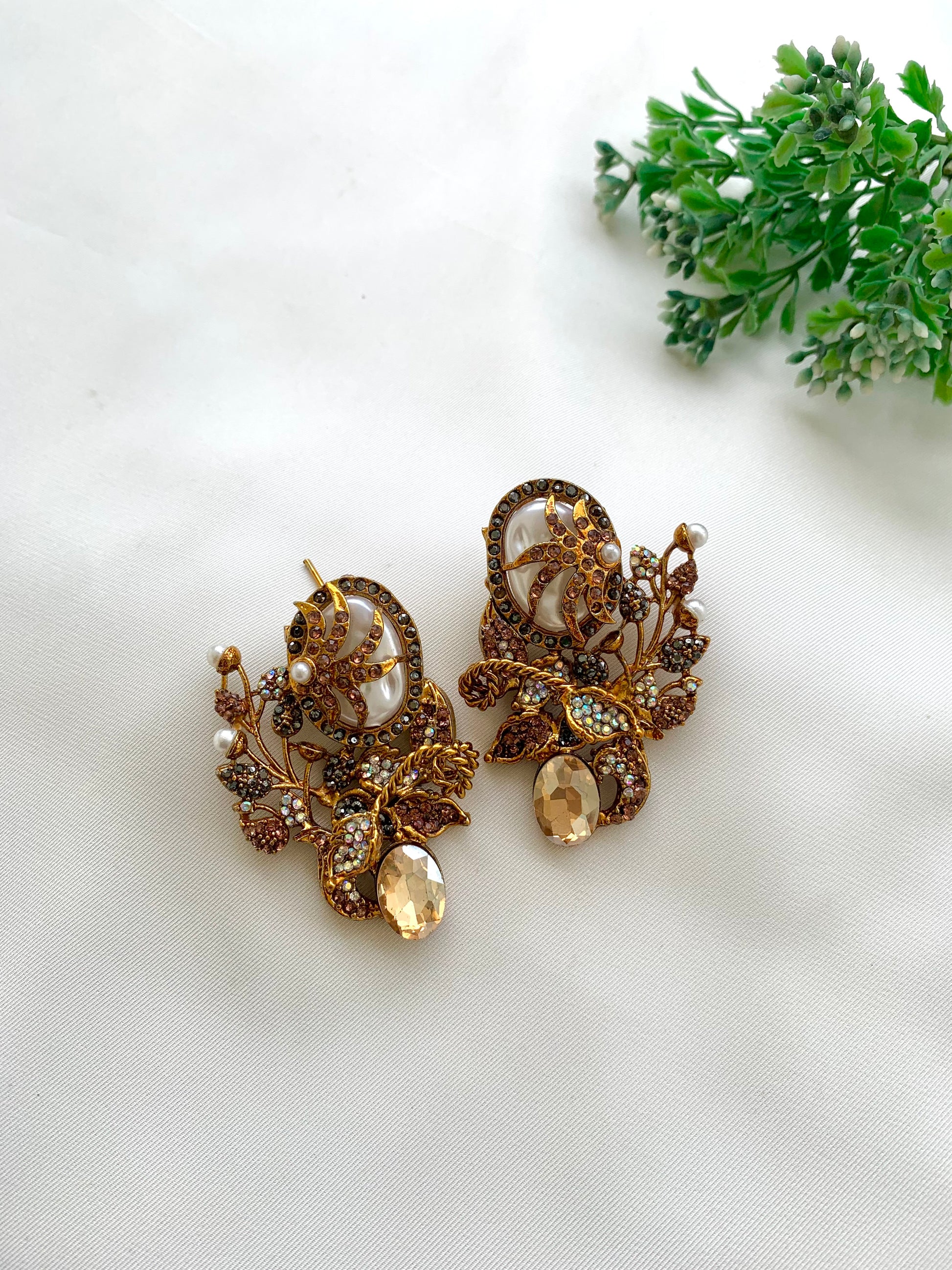 Arhaa handcrafted 22kt gold plated earrings featuring genuine Baroque Pearls, Marcasite crystals, and Pearls, available in Emerald, Champagne, Mint, and Citrine variants