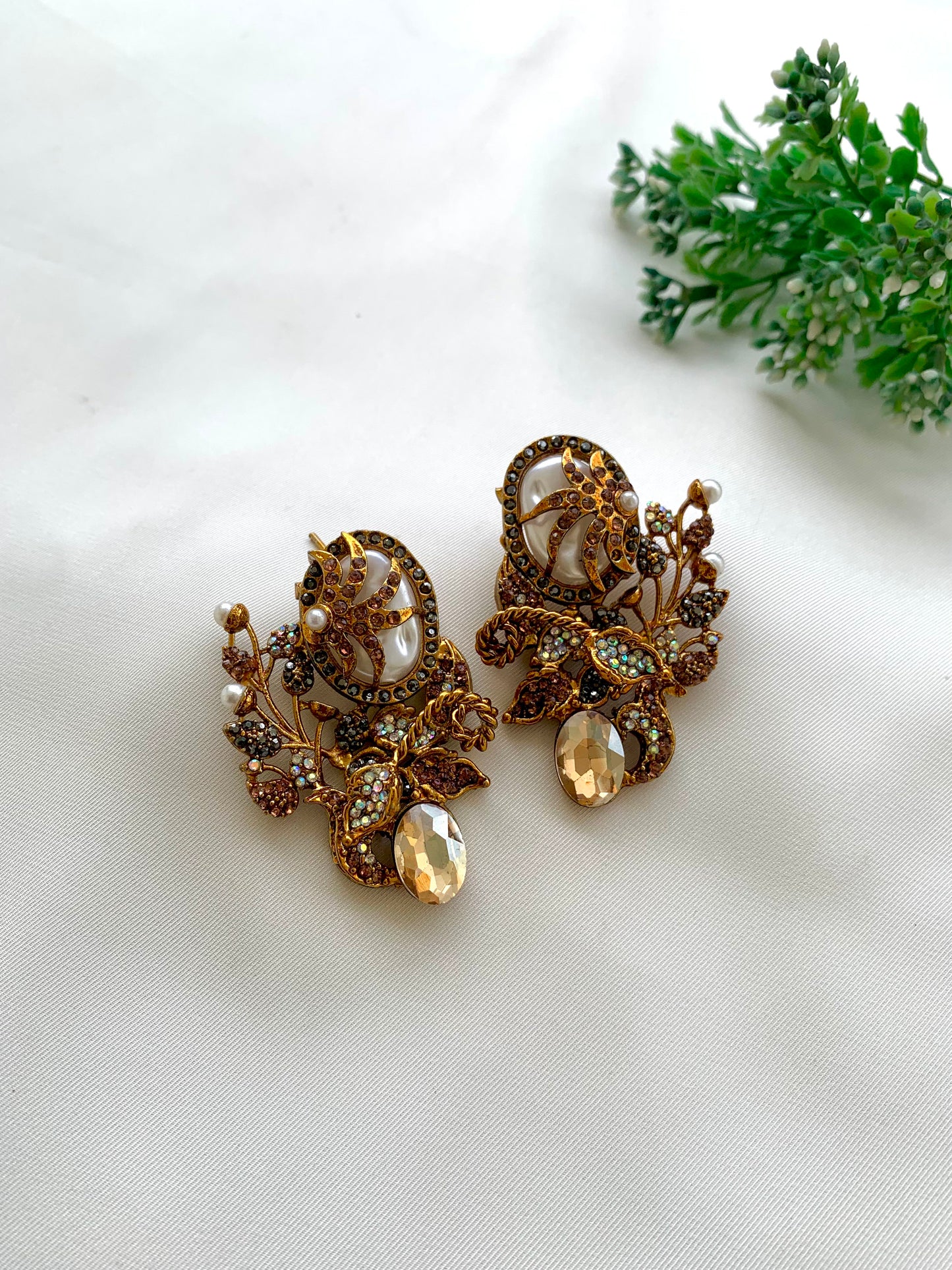 Arhaa handcrafted 22kt gold plated earrings featuring genuine Baroque Pearls, Marcasite crystals, and Pearls, available in Emerald, Champagne, Mint, and Citrine variants