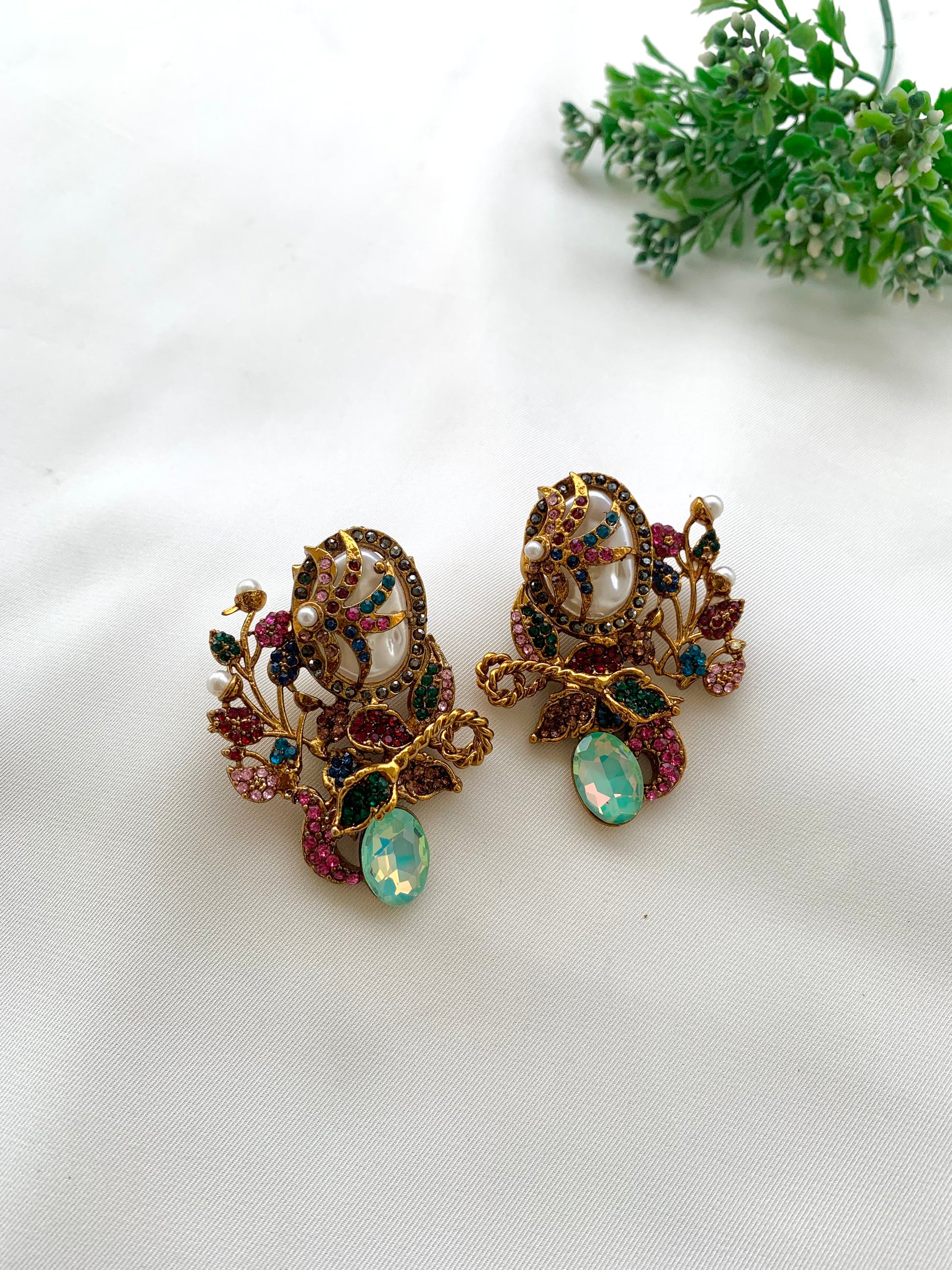 Arhaa handcrafted 22kt gold plated earrings featuring genuine Baroque Pearls, Marcasite crystals, and Pearls, available in Emerald, Champagne, Mint, and Citrine variants