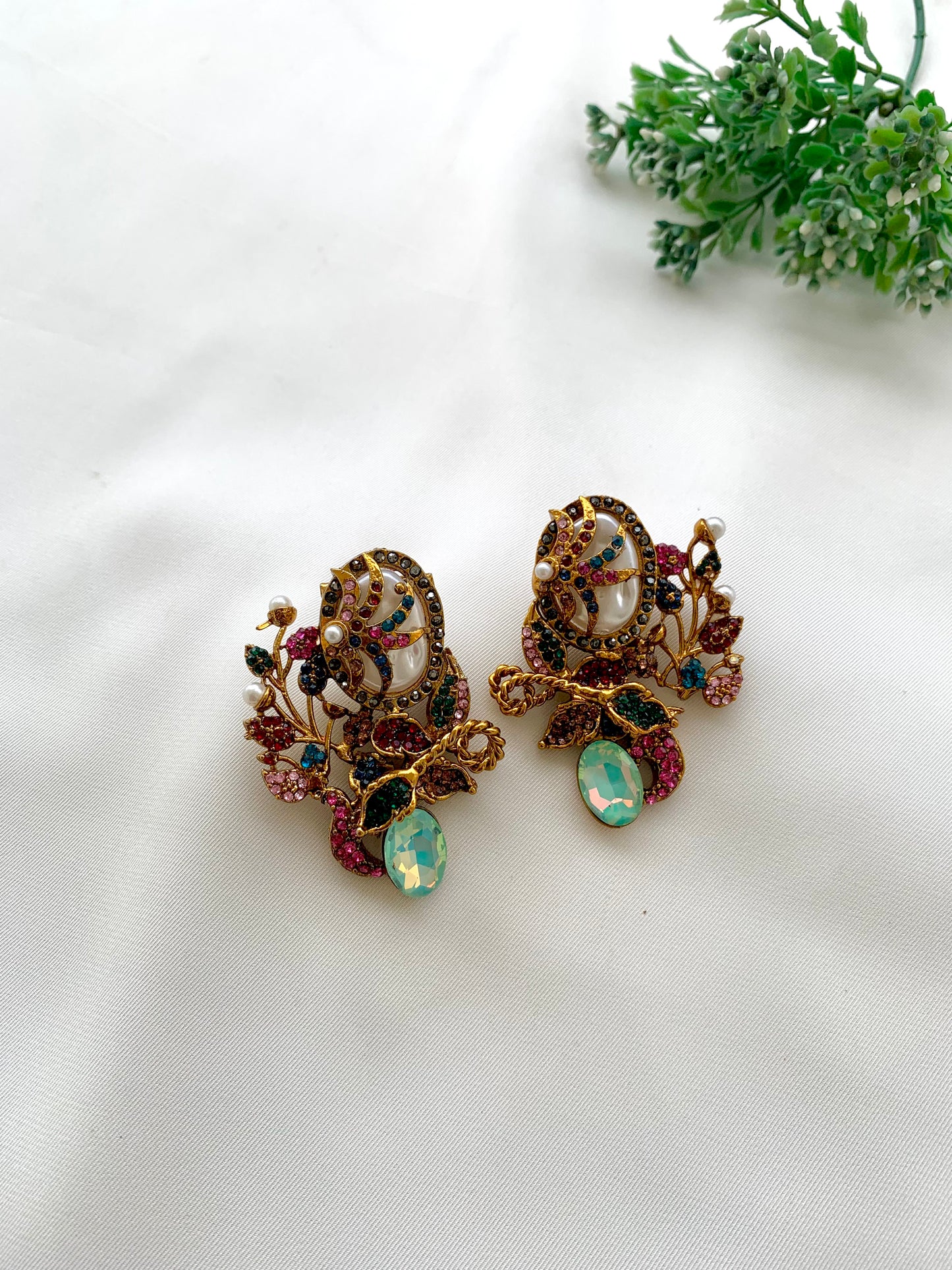 Arhaa handcrafted 22kt gold plated earrings featuring genuine Baroque Pearls, Marcasite crystals, and Pearls, available in Emerald, Champagne, Mint, and Citrine variants