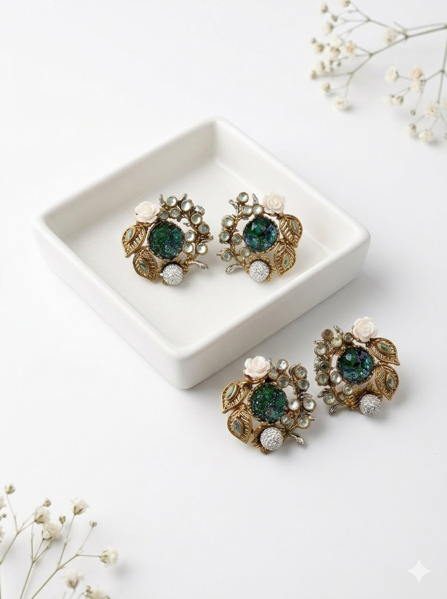 Athena emerald kundan earrings in gold plating with American diamonds and gemstone detailing