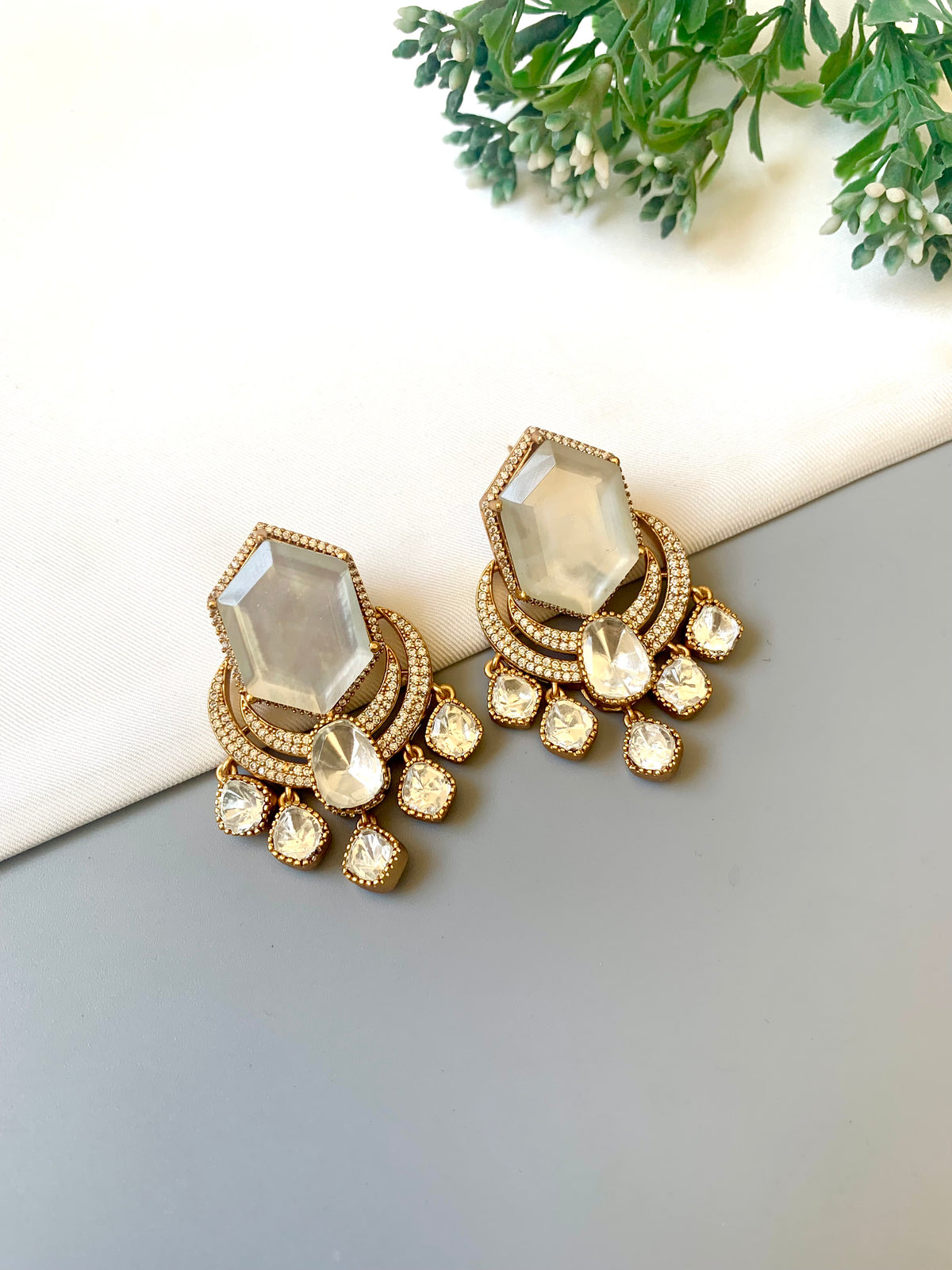 Avaani Ivory handcrafted earrings with American Diamonds, Polki Diamonds and Doublet Stones