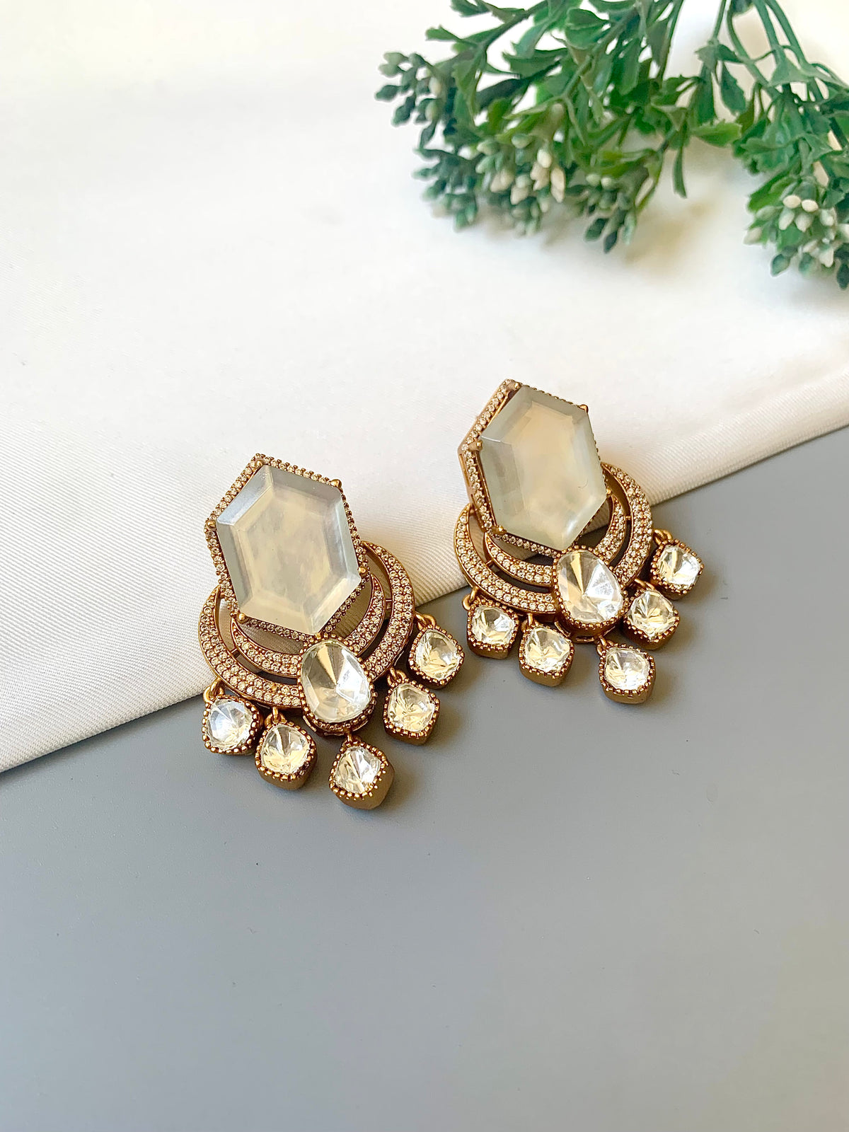 Avaani Ivory handcrafted earrings with American Diamonds, Polki Diamonds and Doublet Stones