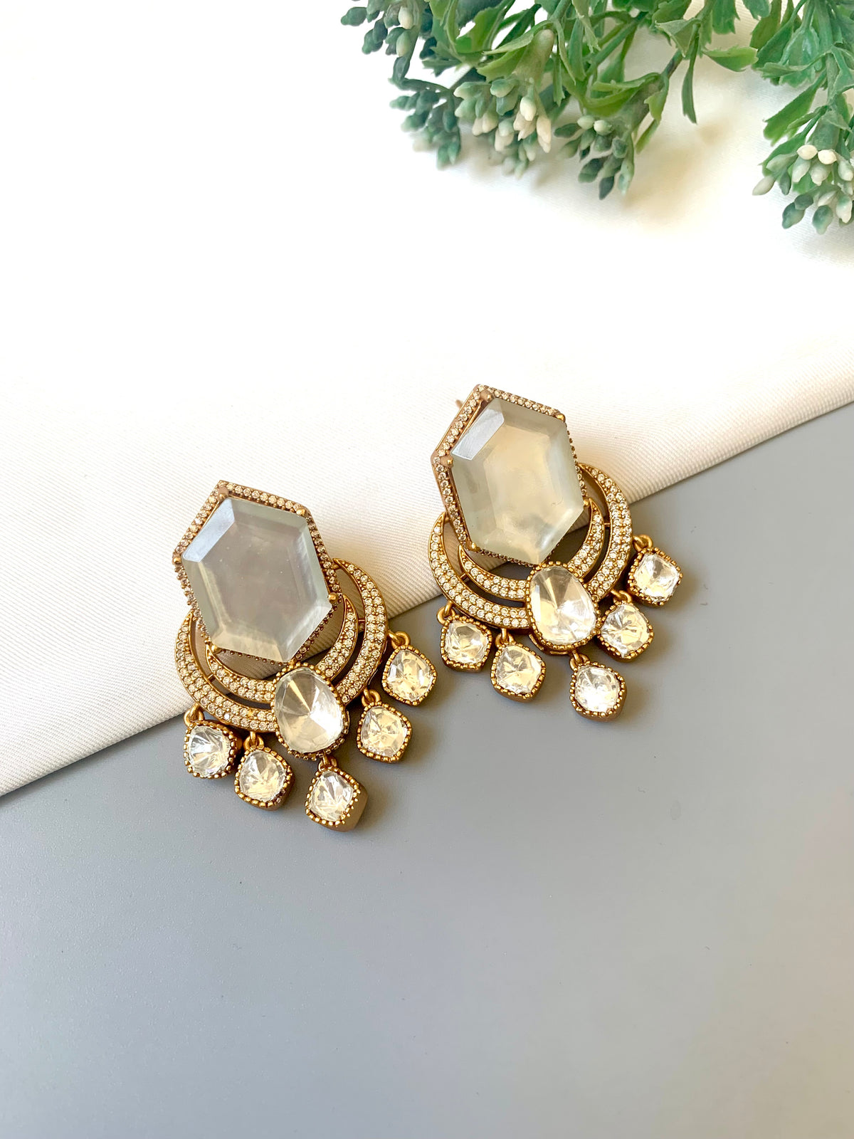Avaani Ivory handcrafted earrings with American Diamonds, Polki Diamonds and Doublet Stones