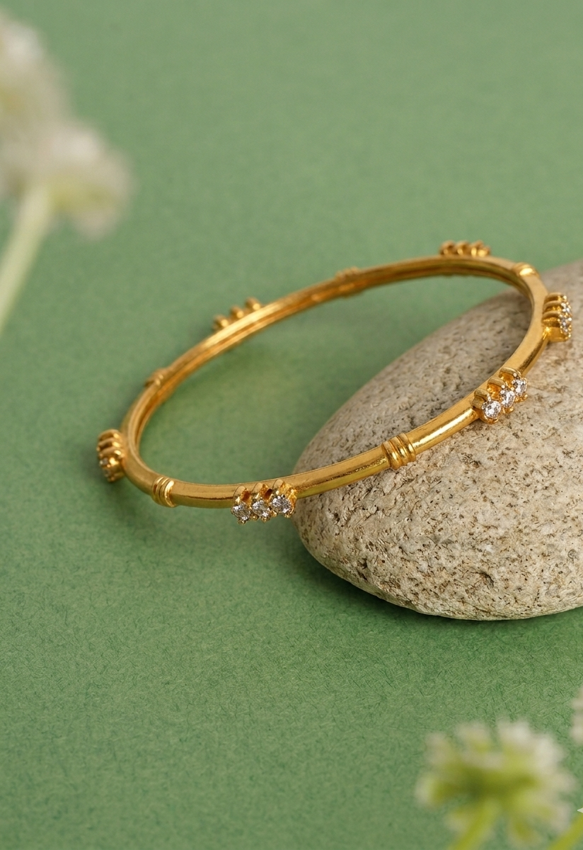 Handcrafted 22kt gold plated bangle with diamond finish and high quality American Diamonds