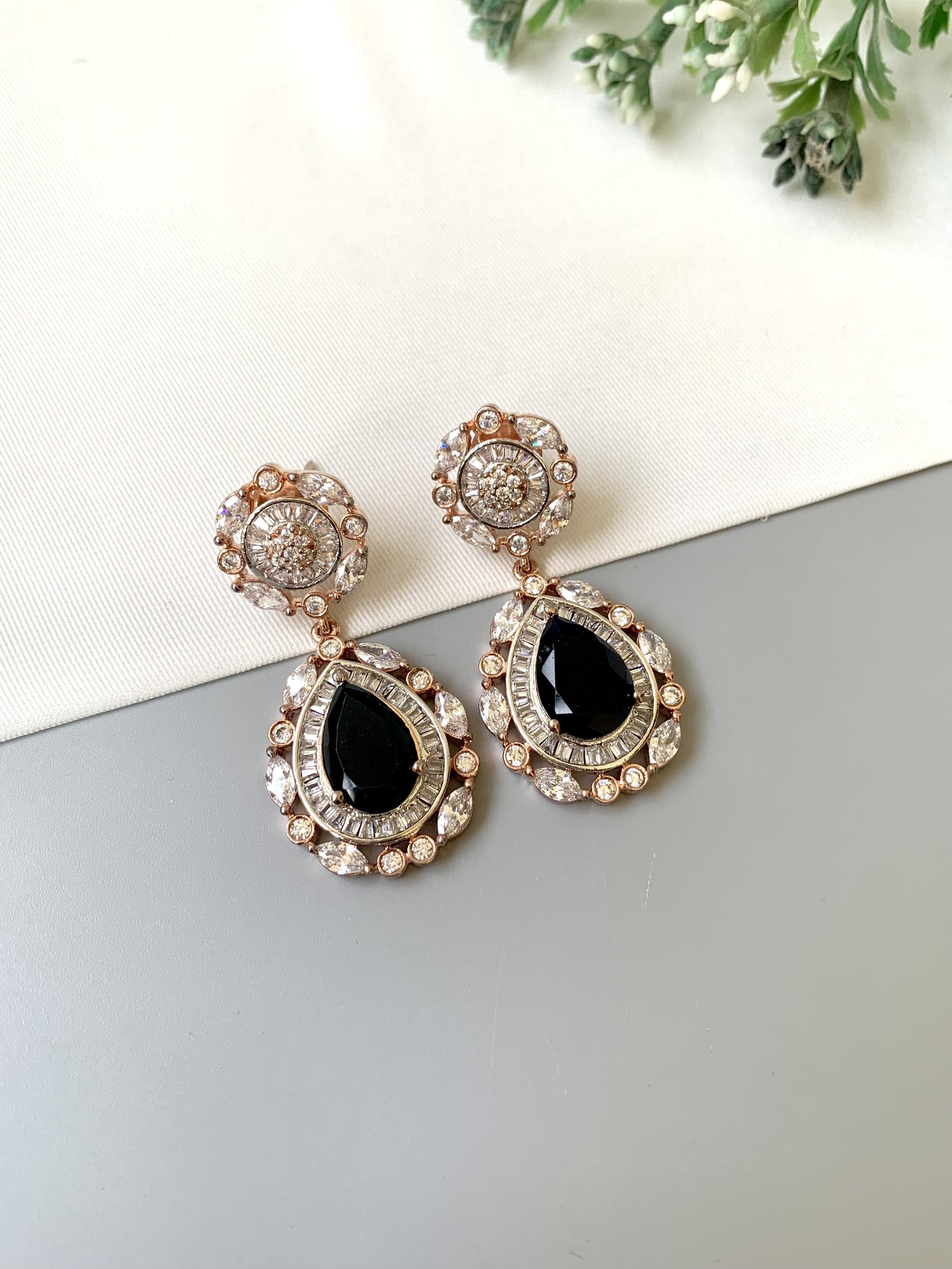 Handcrafted Victorian rose gold earrings with semi-precious sapphires and American diamonds by Zamal Jewels.