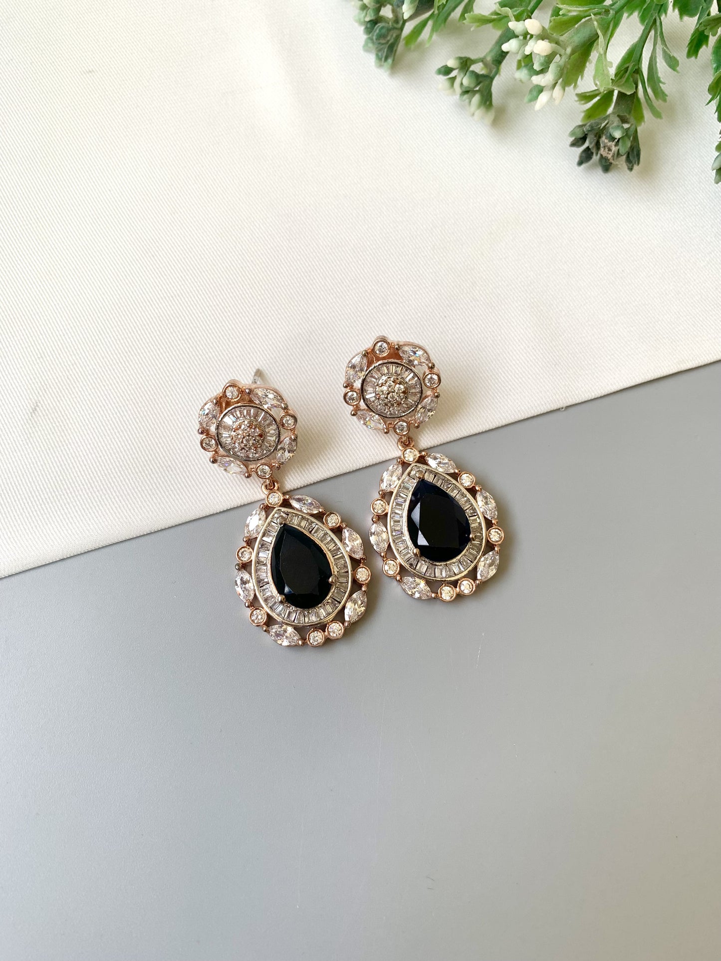 Handcrafted Victorian rose gold earrings with semi-precious sapphires and American diamonds by Zamal Jewels.