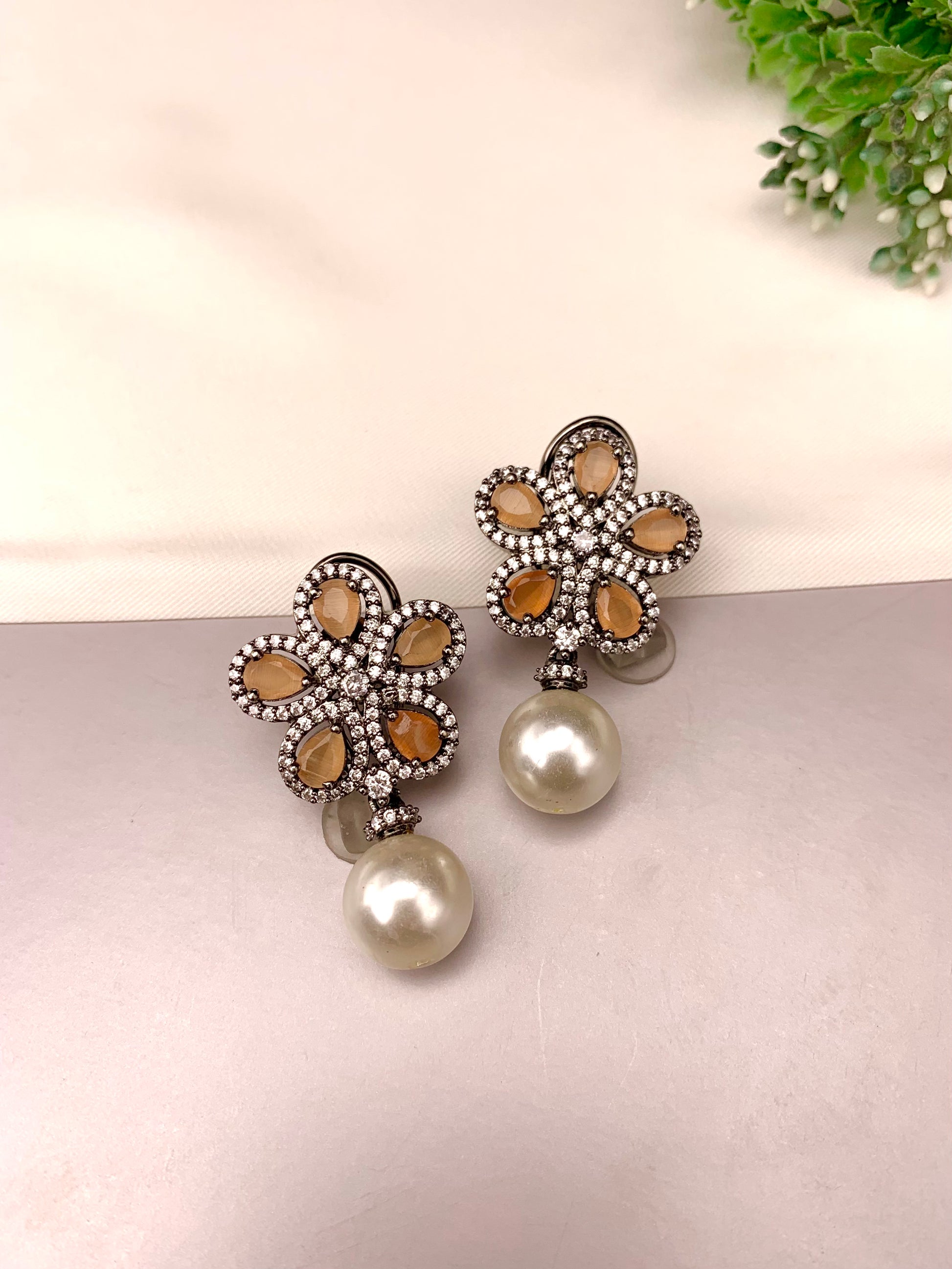 Ermina handcrafted rhodium plated oxidized earrings featuring American Diamonds, semi-precious Onyx and Pearls