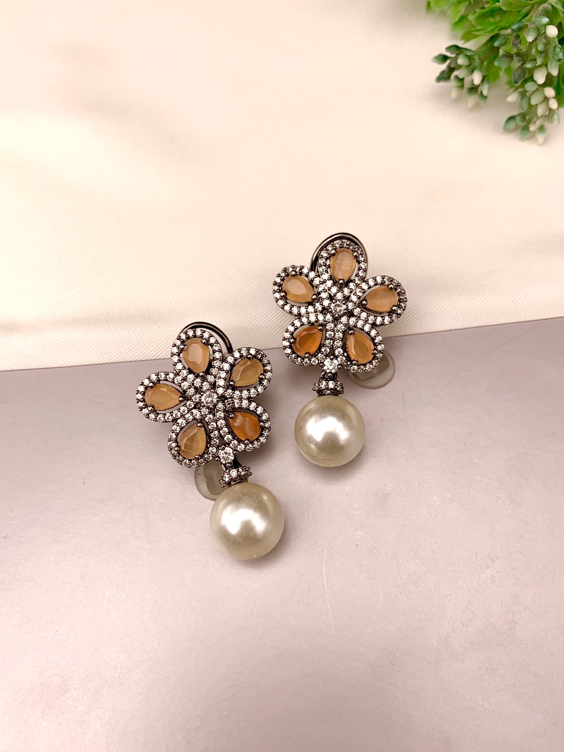 Ermina handcrafted rhodium plated oxidized earrings featuring American Diamonds, semi-precious Onyx and Pearls