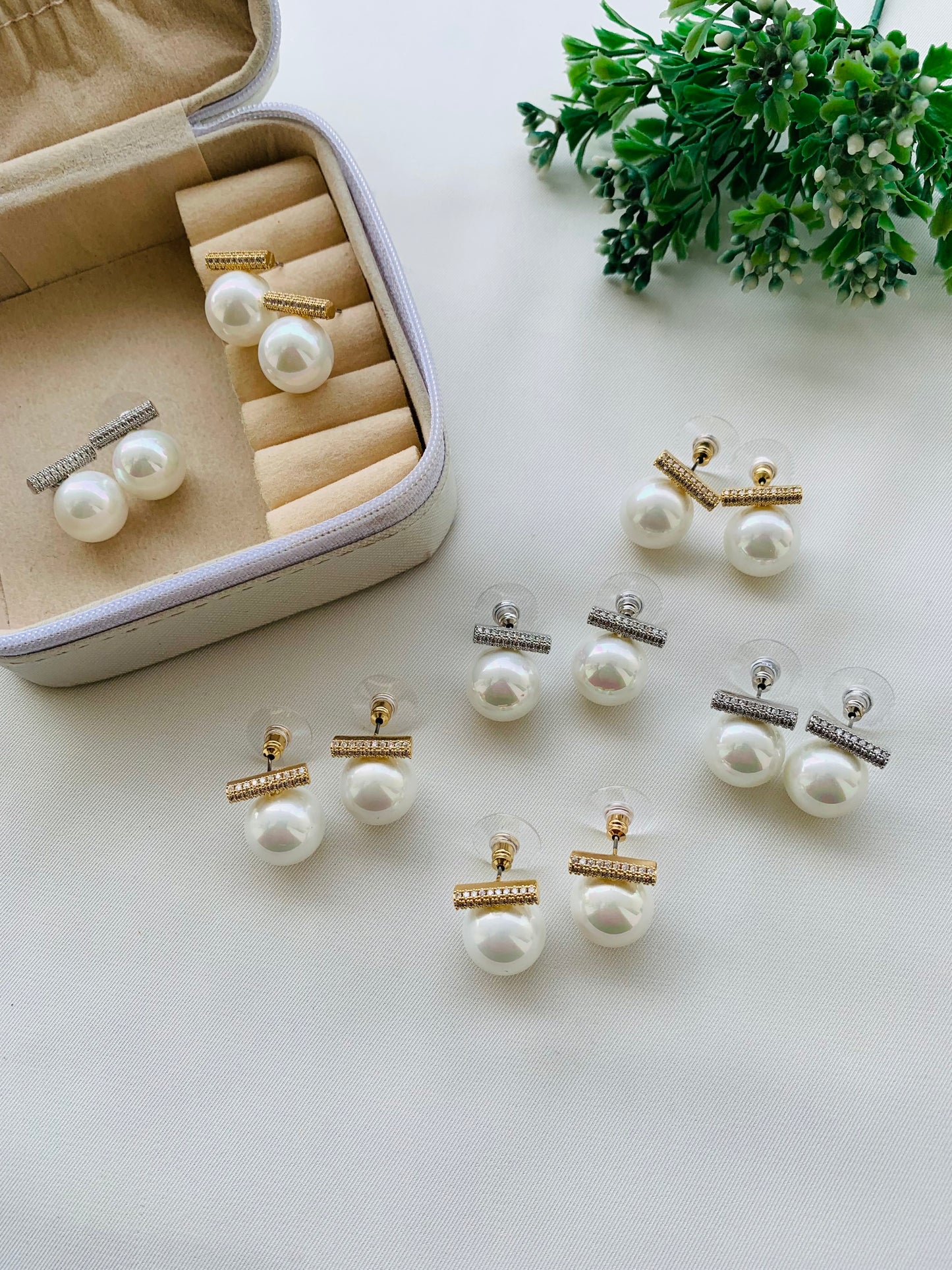 Freda handcrafted American Diamond and semi-precious Pearl studs in 22kt gold and rhodium plating