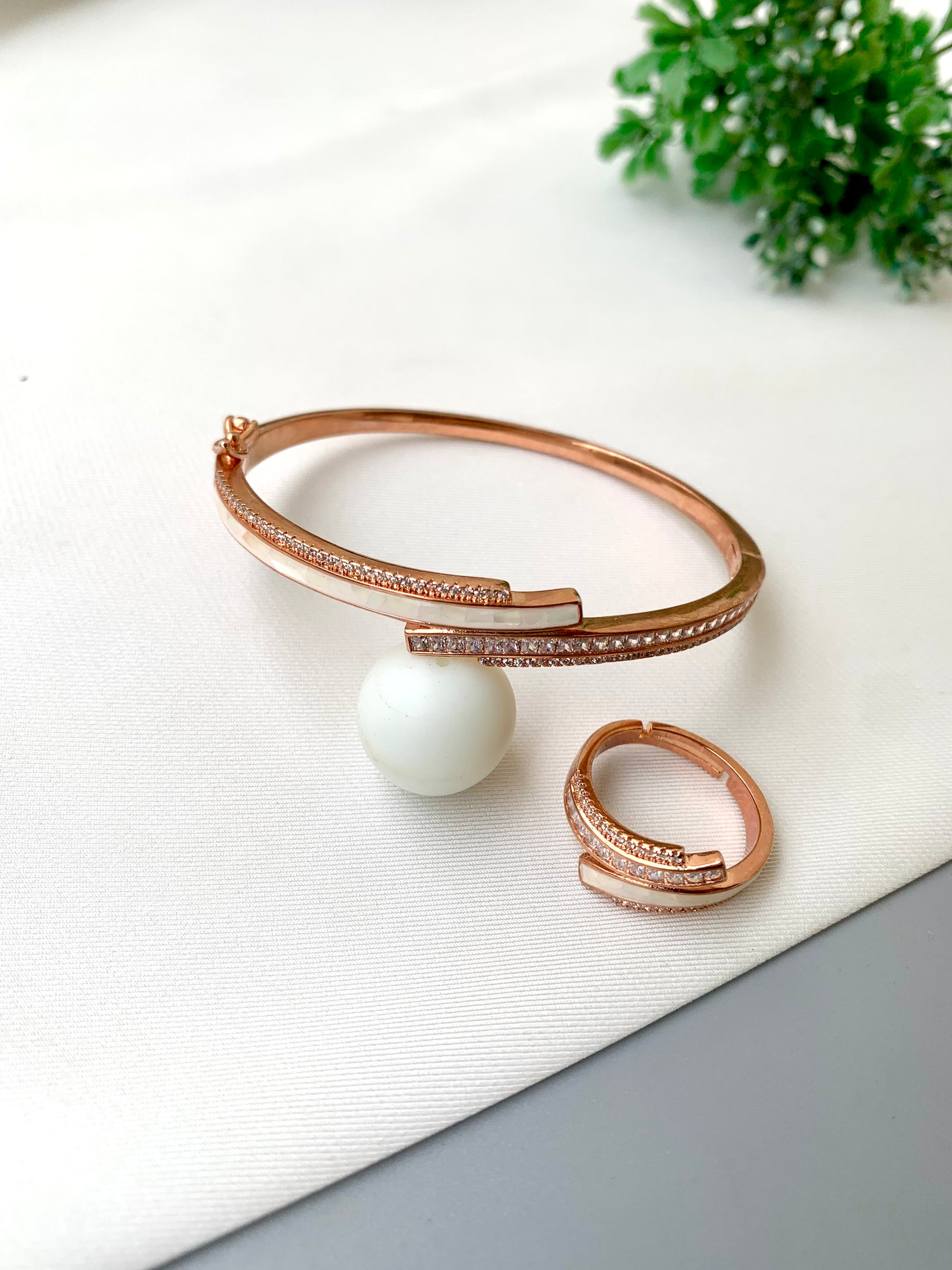 Gabana handcrafted 22kt rose gold bracelet and adjustable ring combo with American Diamonds and real Mother of Pearl