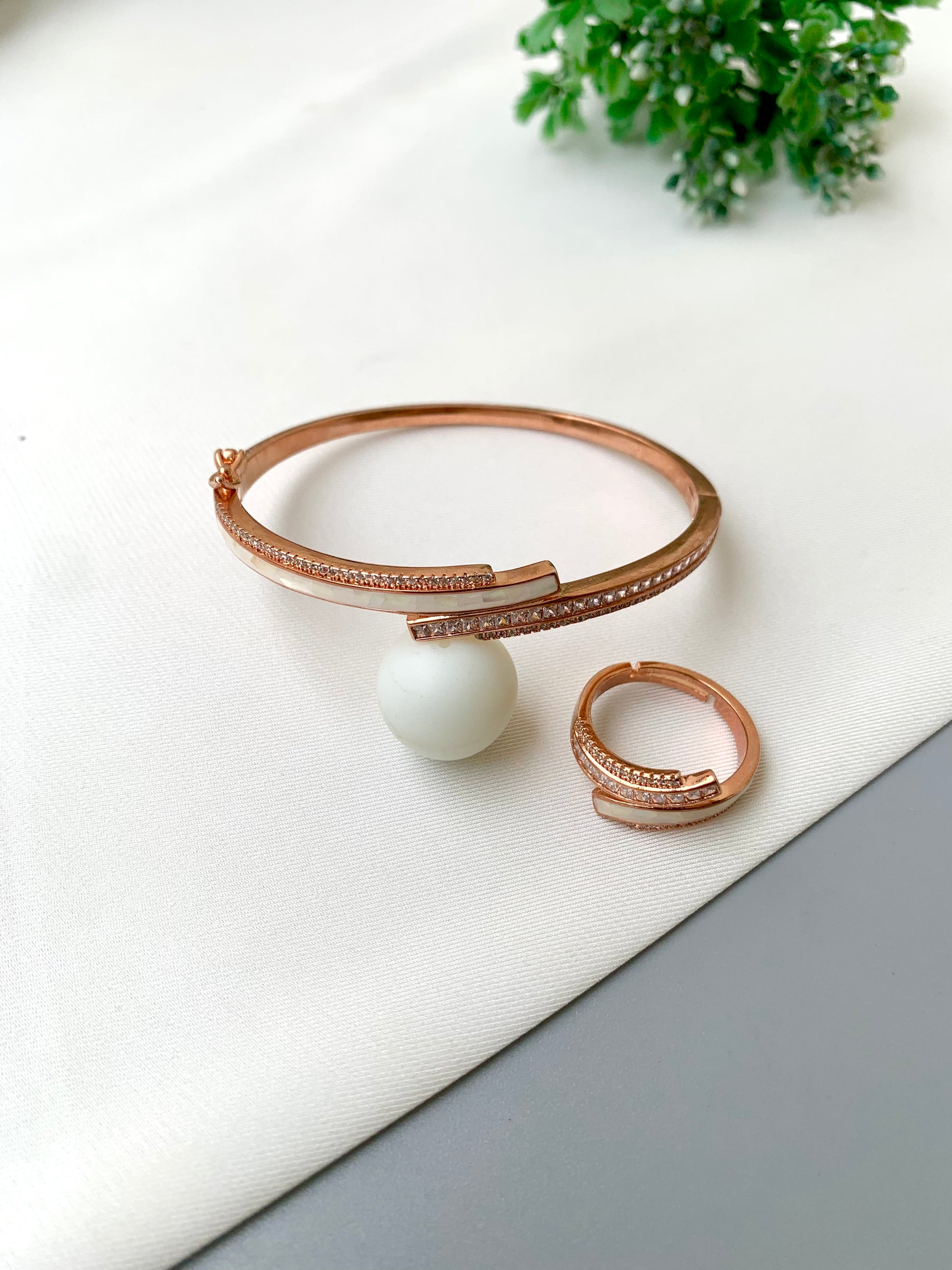 Gabana handcrafted 22kt rose gold bracelet and adjustable ring combo with American Diamonds and real Mother of Pearl
