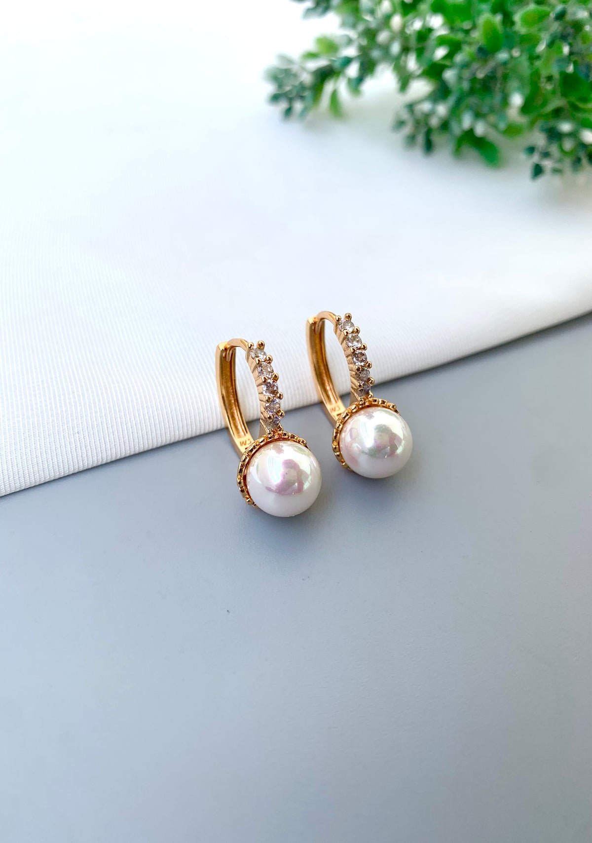 Geena handcrafted 22kt Gold plated studs with American Diamonds and semi-precious Pearls
