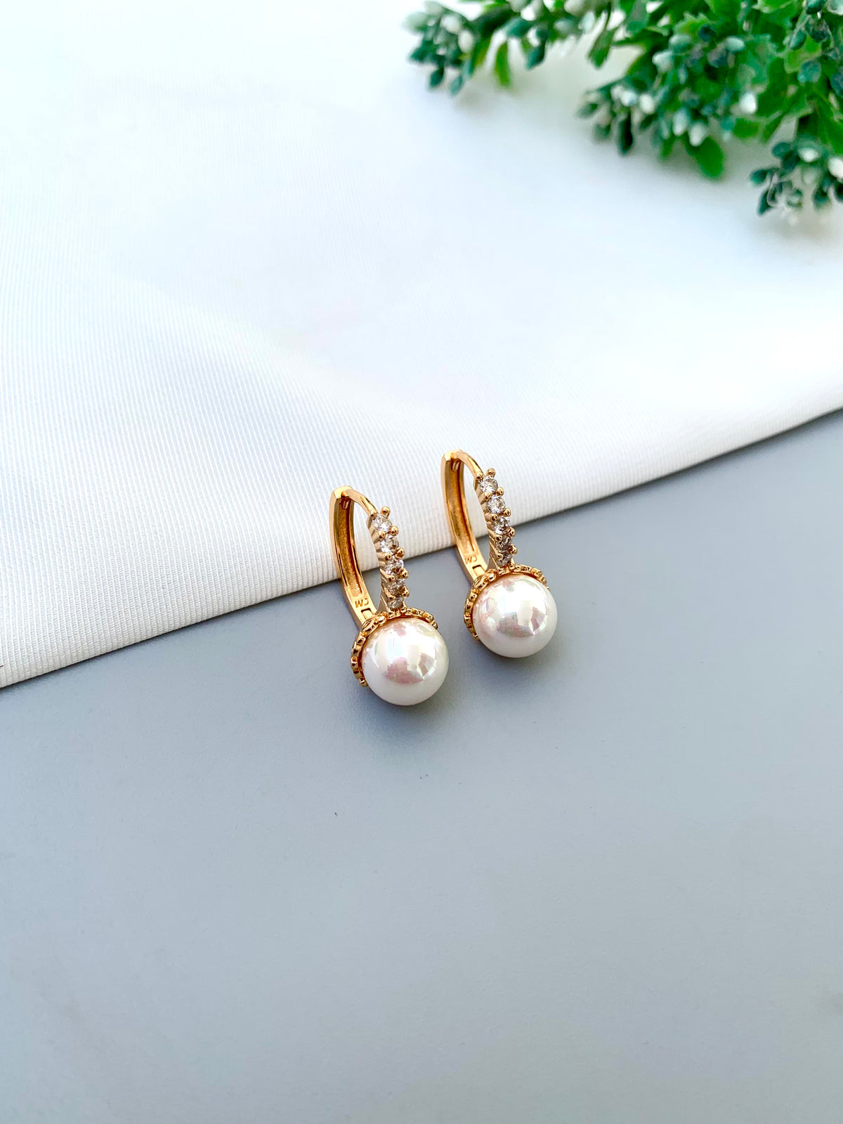 Geena handcrafted 22kt Gold plated studs with American Diamonds and semi-precious Pearls