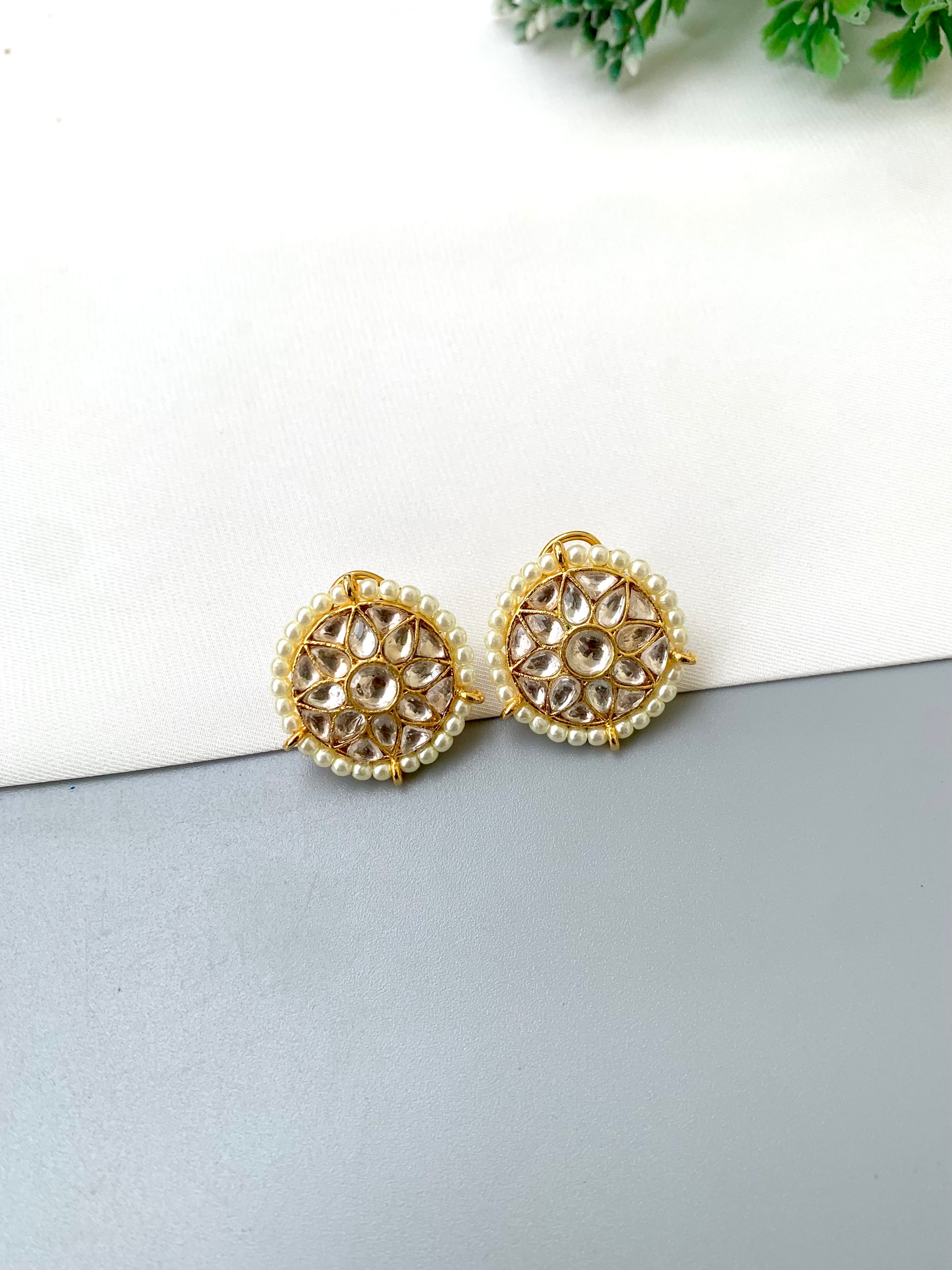 Geeta handcrafted 22kt gold plated studs featuring high-quality Polki Kundan and semi-precious pearls