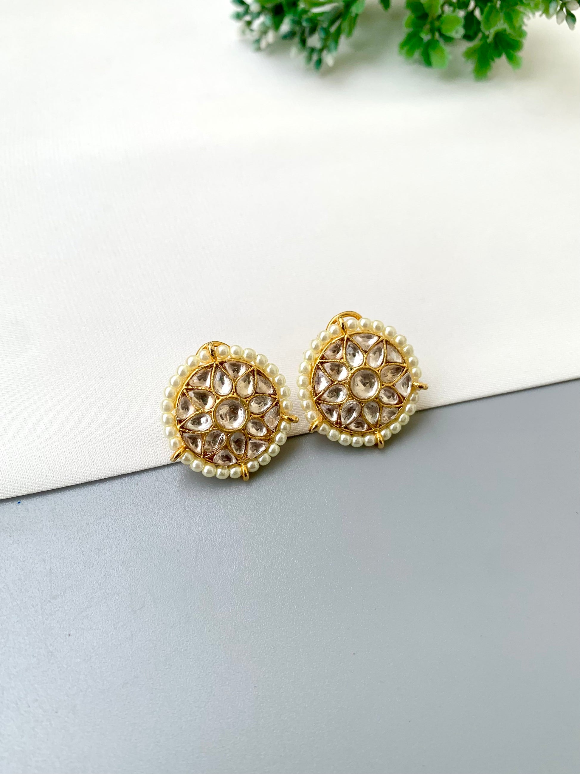 Geeta handcrafted 22kt gold plated studs featuring high-quality Polki Kundan and semi-precious pearls