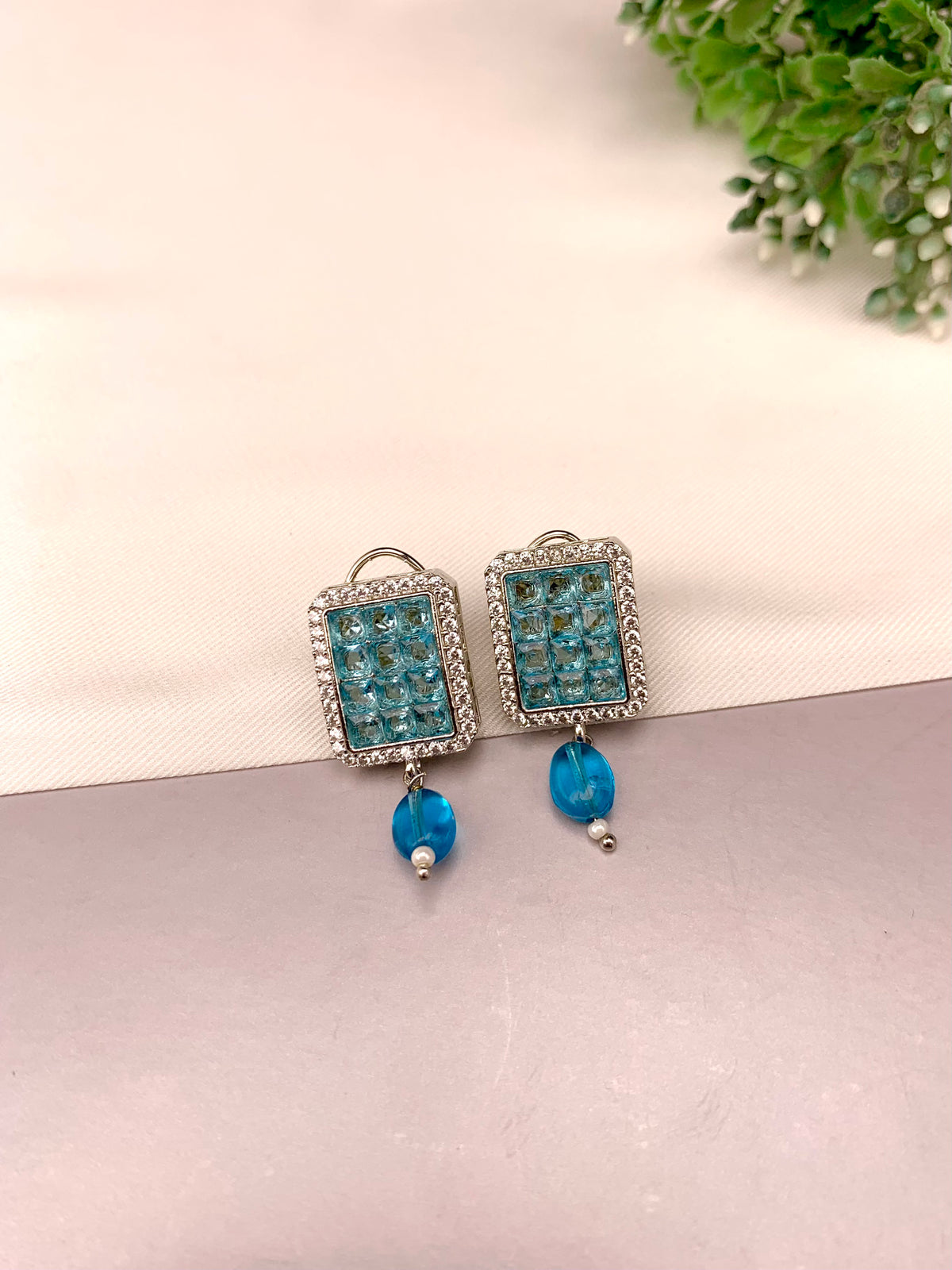 Ameena handcrafted earrings with American Diamonds and semi-precious crystals, available in Sapphire, Emerald, Mint, Ruby and Ferozi variants