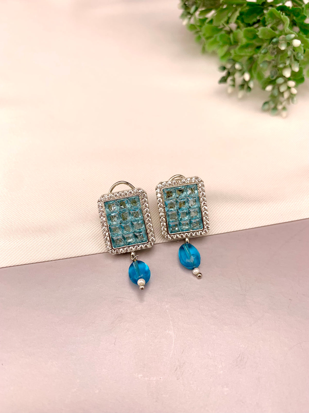 Ameena handcrafted earrings with American Diamonds and semi-precious crystals, available in Sapphire, Emerald, Mint, Ruby and Ferozi variants
