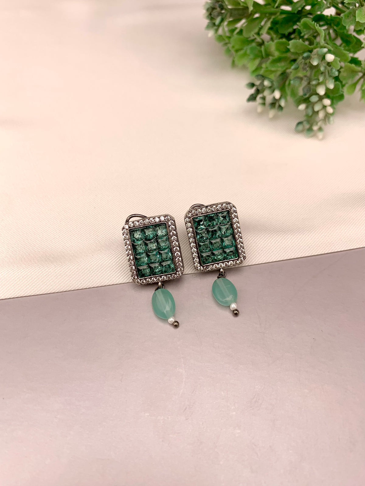 Ameena handcrafted earrings with American Diamonds and semi-precious crystals, available in Sapphire, Emerald, Mint, Ruby and Ferozi variants