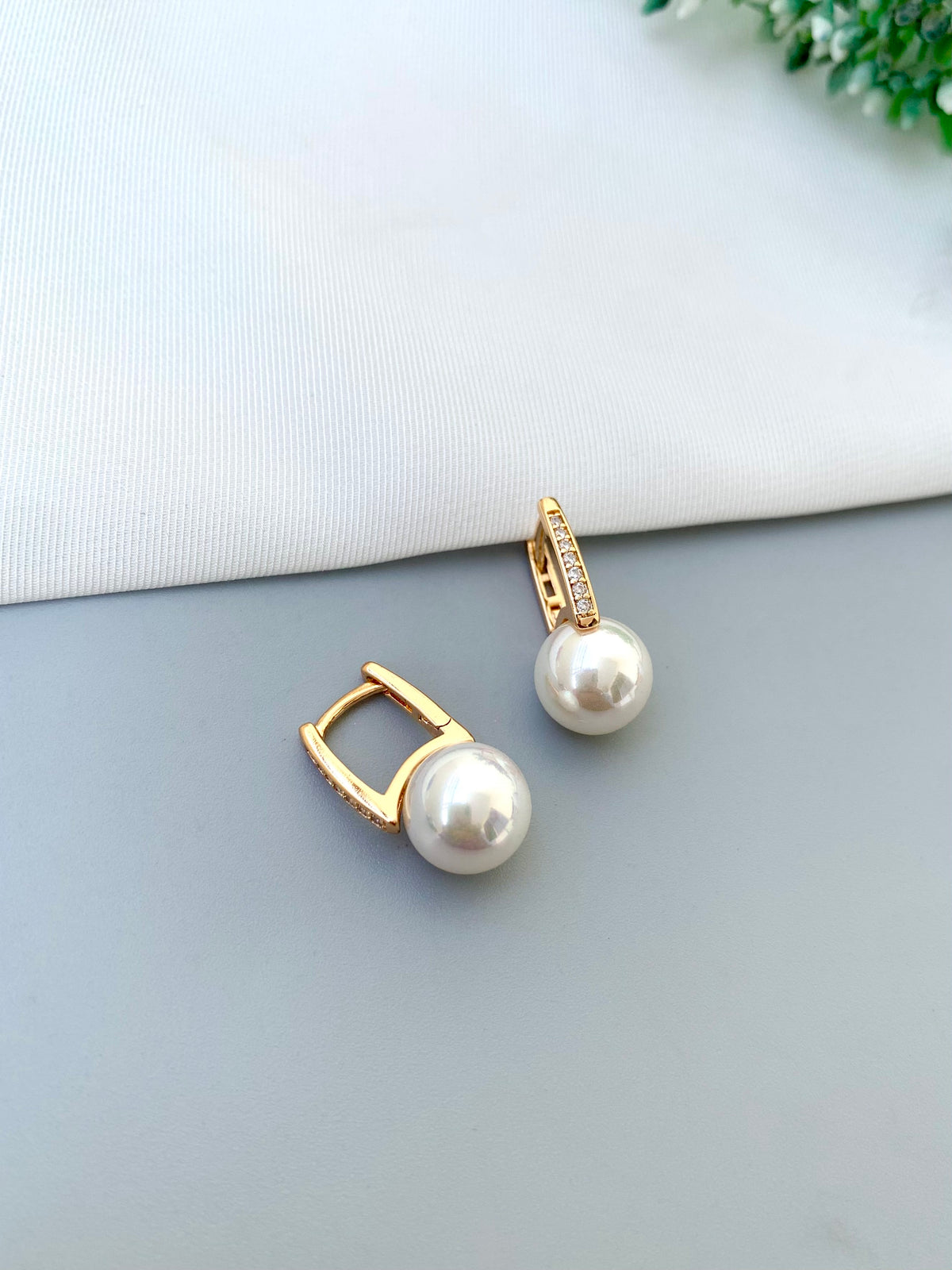 Liyah handcrafted 22kt Gold plated studs with American Diamonds and semi-precious Pearls