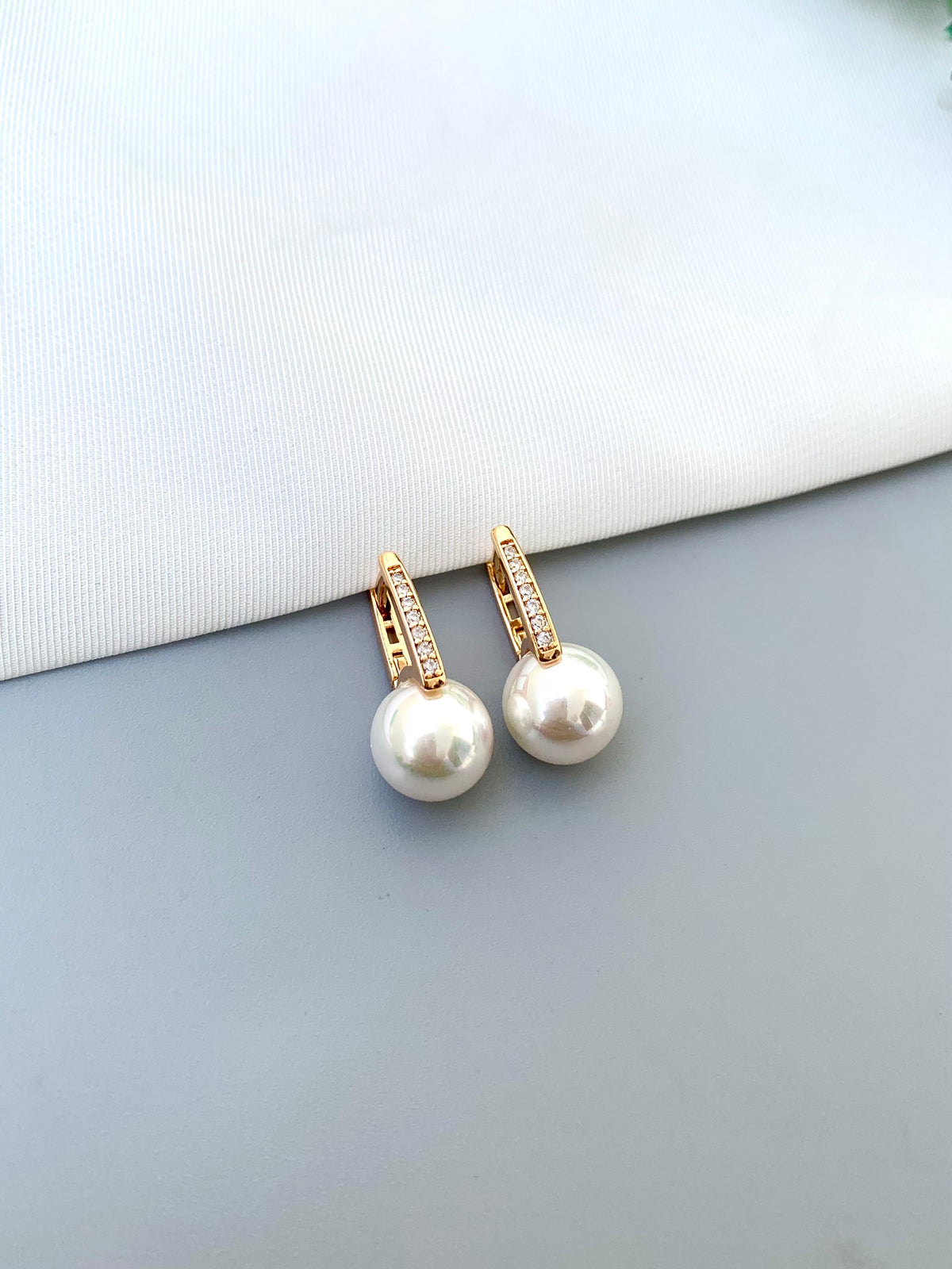 Liyah handcrafted 22kt Gold plated studs with American Diamonds and semi-precious Pearls