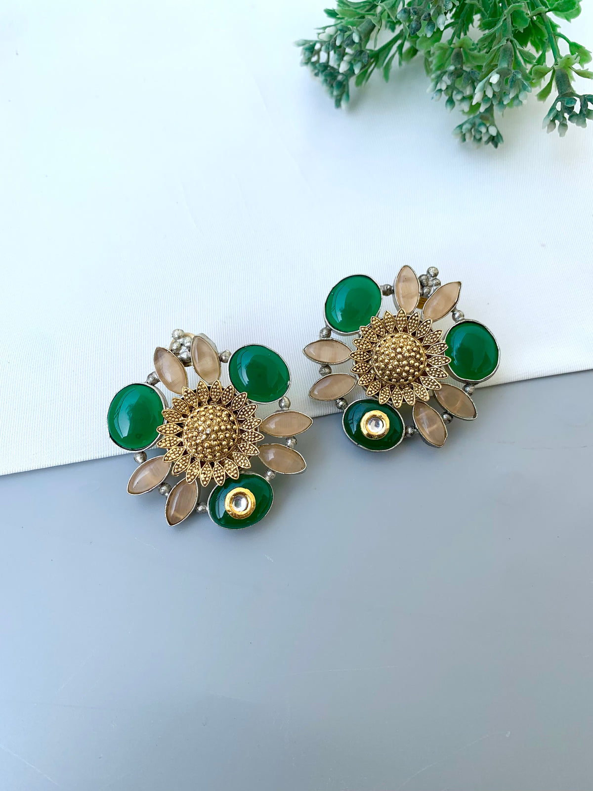 Luna handcrafted oversized Rhodium plated studs with Polki Kundan, Emerald and Onyx