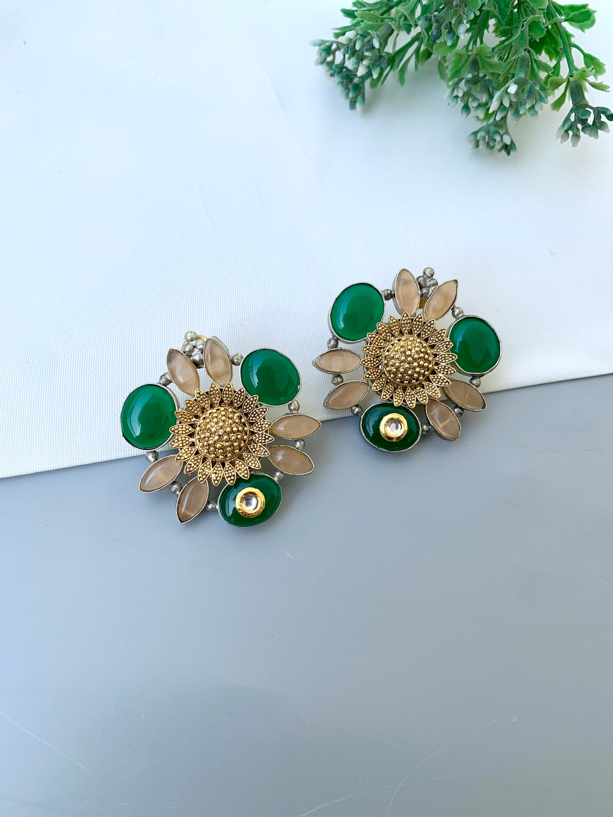 Luna handcrafted oversized Rhodium plated studs with Polki Kundan, Emerald and Onyx