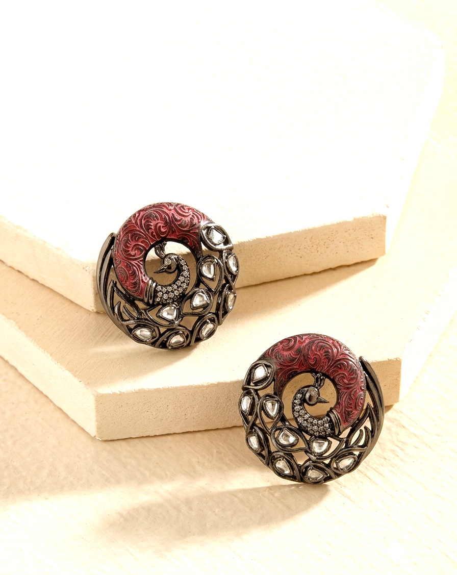 Madhu handcrafted peacock studs with American Diamonds, Polki Kundan and hand-painted Meena in black oxidized rhodium finish