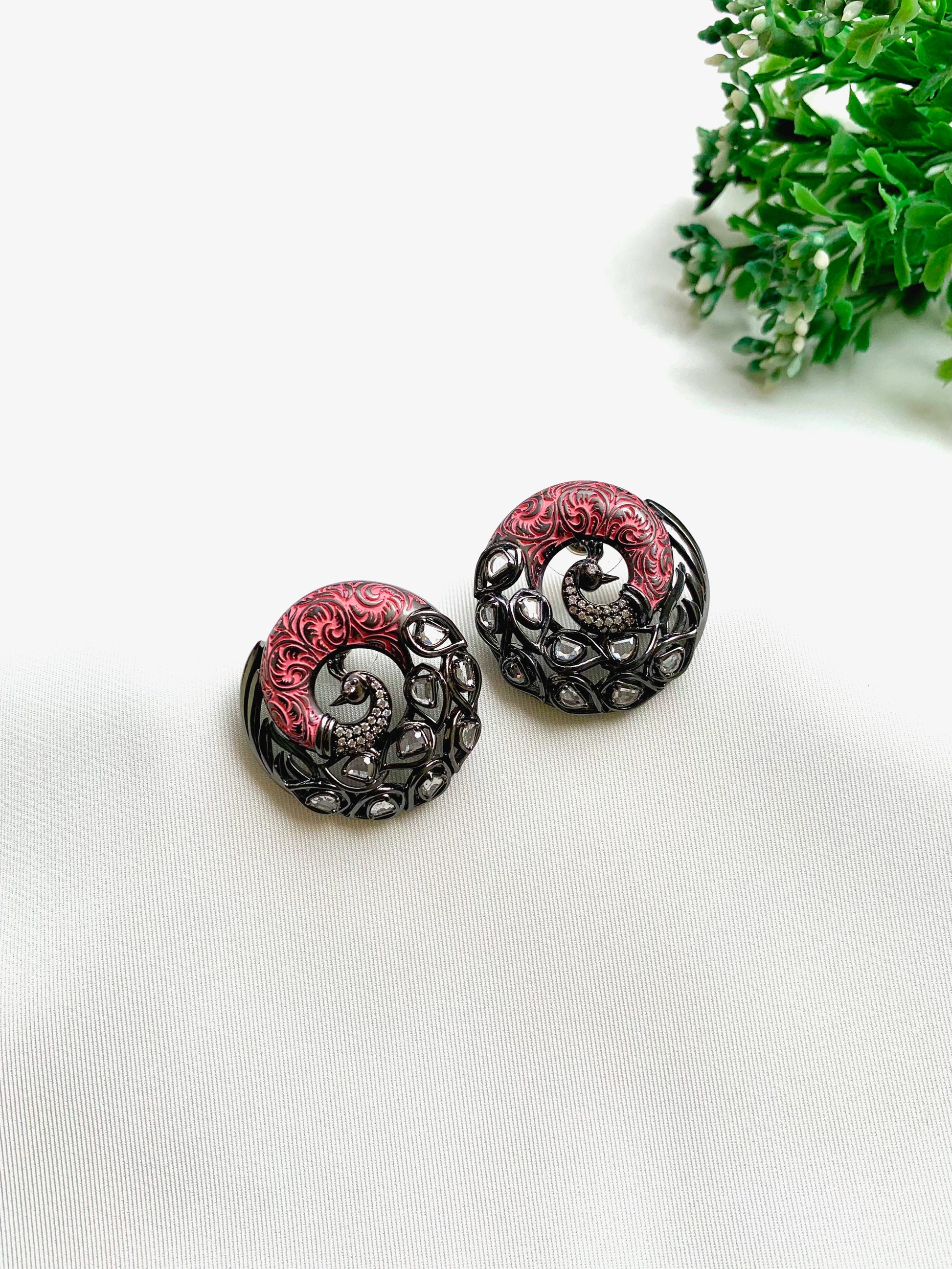 Madhu handcrafted peacock studs with American Diamonds, Polki Kundan and hand-painted Meena in black oxidized rhodium finish