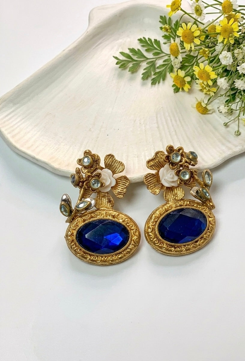 Maha floral kundan earrings in gold plating with acrylic flowers and gemstone detailing