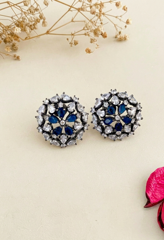 Marvi rhodium plated oxidized studs with American diamonds and sapphire accents