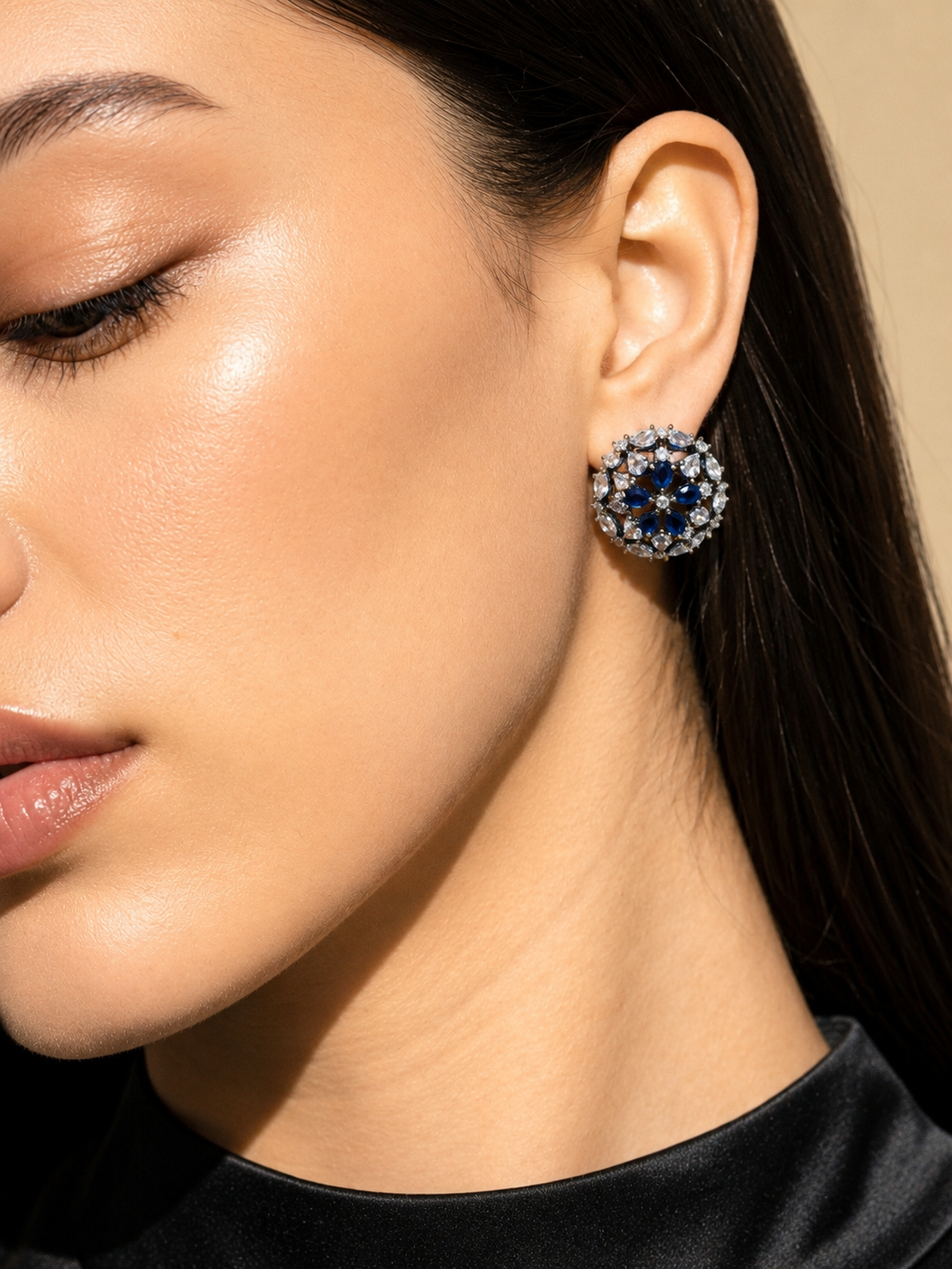 Marvi rhodium plated oxidized studs with American diamonds and sapphire accents