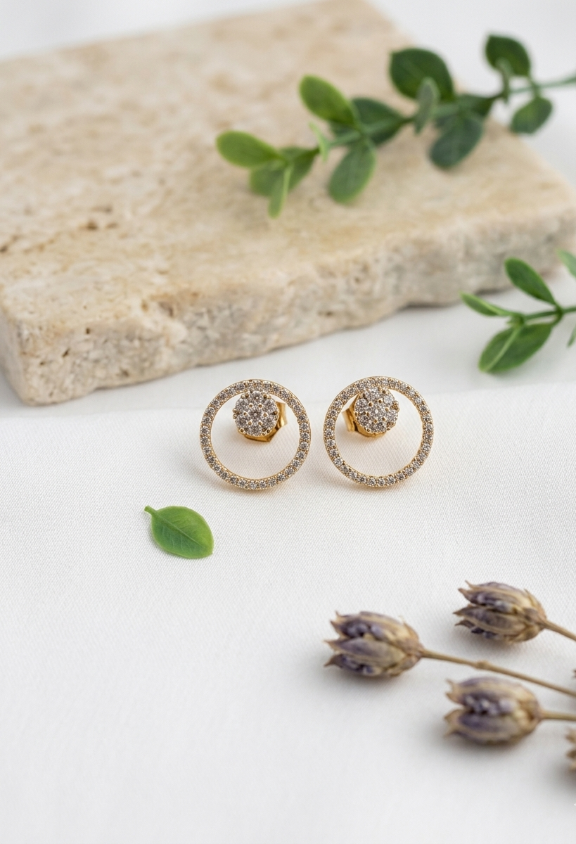 Mina gold plated studs in diamond finish with American diamonds