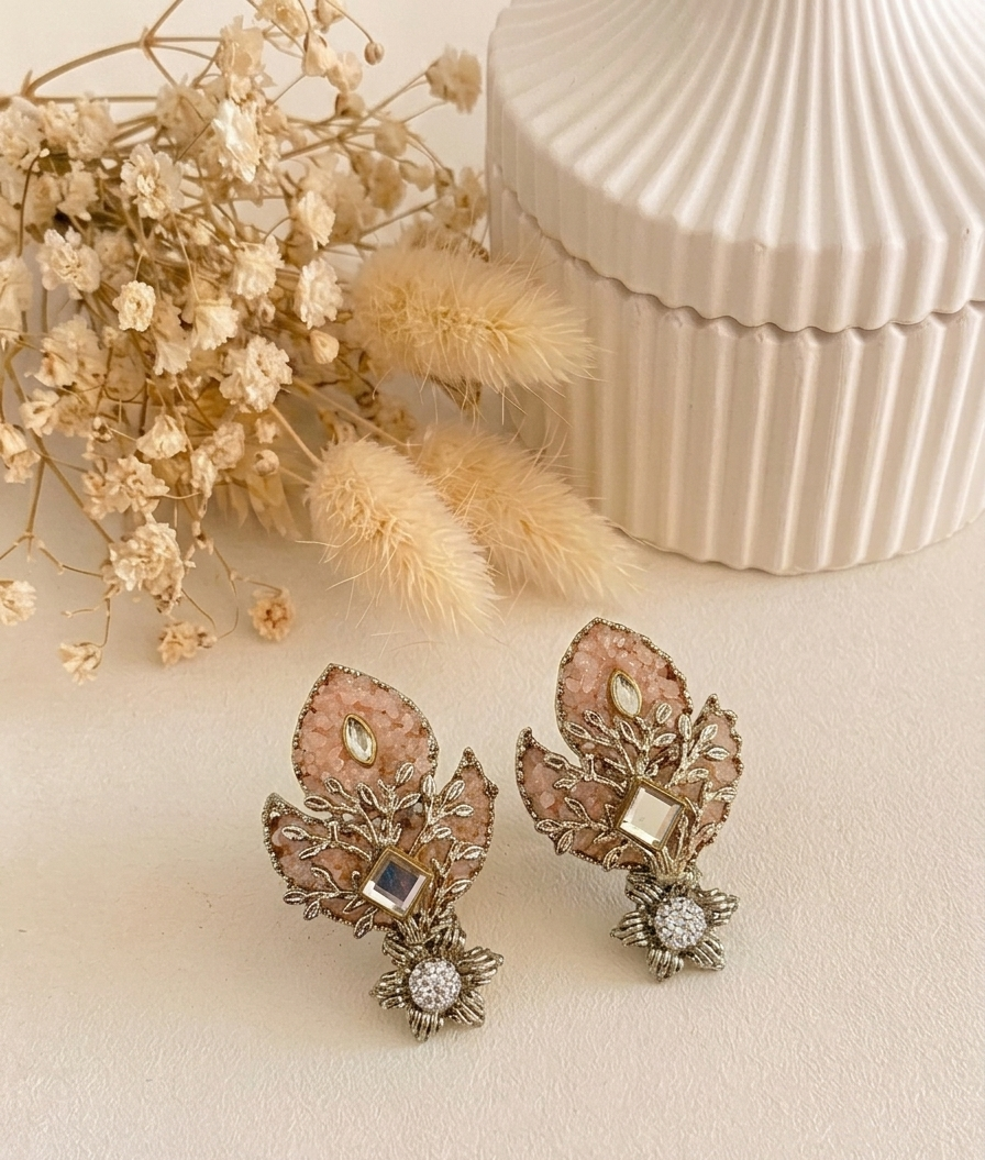 Naghma handcrafted earrings featuring American Diamonds, Kundan, and semi-precious Pearls, available in White (22kt gold plated) and Pink (rhodium plated) variants