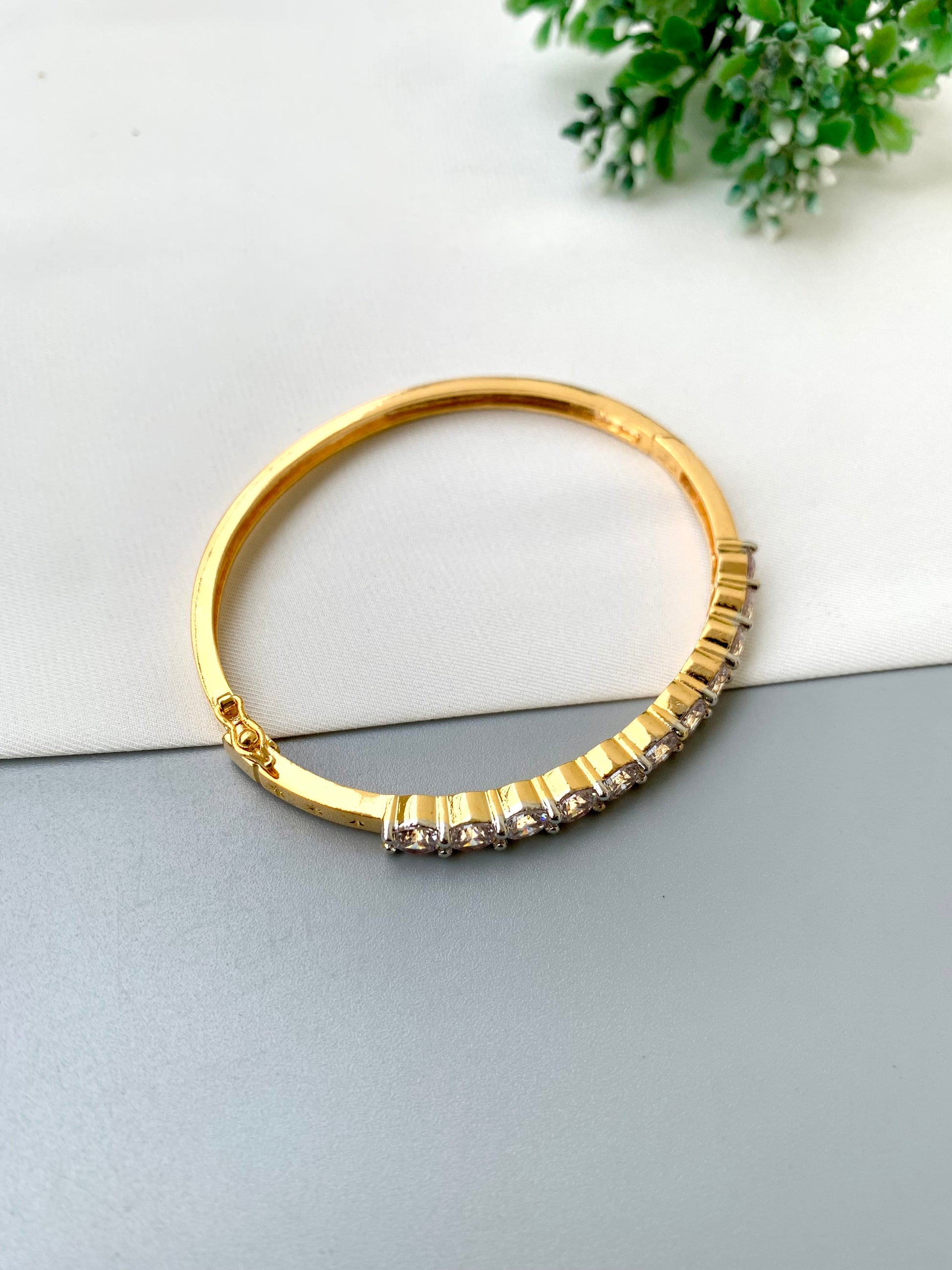 Nancy handcrafted American Diamond bracelet in 22kt gold and Rhodium platinum finish with delicate openable screw design