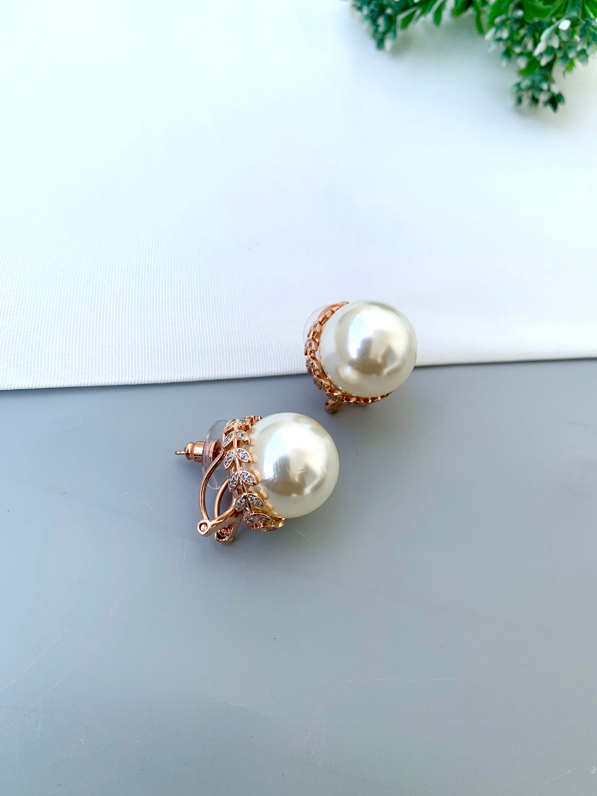 Naniya handcrafted 22kt Rose Gold plated studs with American Diamonds and semi-precious Pearls