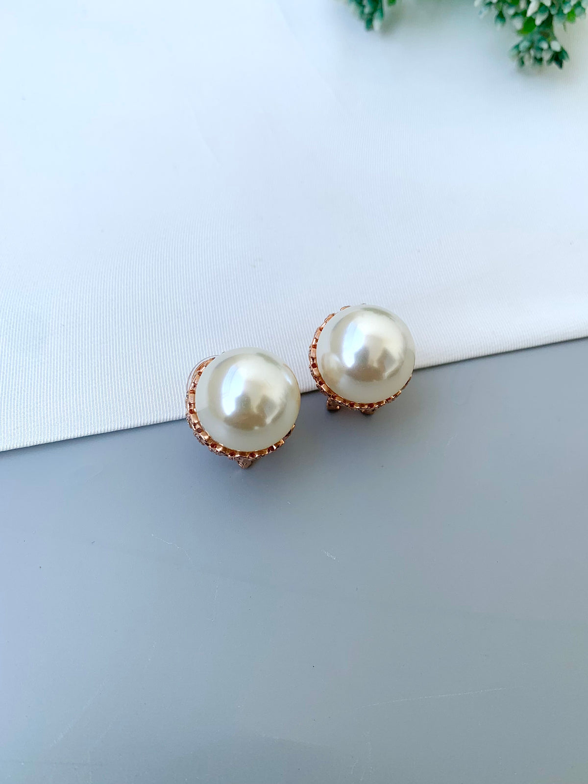 Naniya handcrafted 22kt Rose Gold plated studs with American Diamonds and semi-precious Pearls