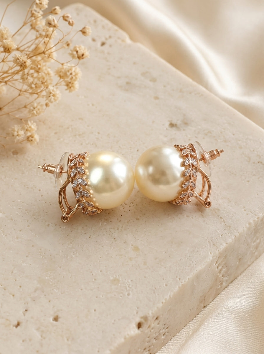 Naniya handcrafted 22kt Rose Gold plated studs with American Diamonds and semi-precious Pearls