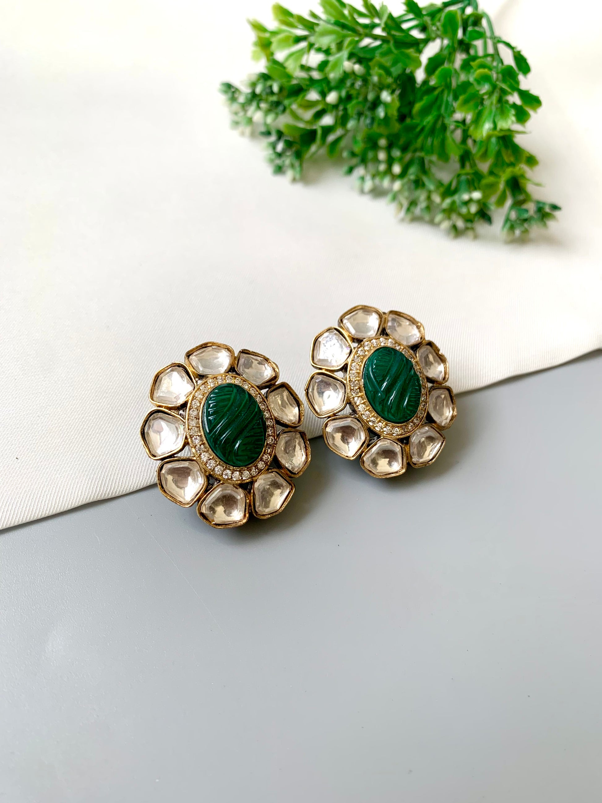 Nayab Emerald Studs with hand-carved Emerald, Polki Kundan, and American Diamonds in 22kt Victorian gold plating by Zamal Jewels