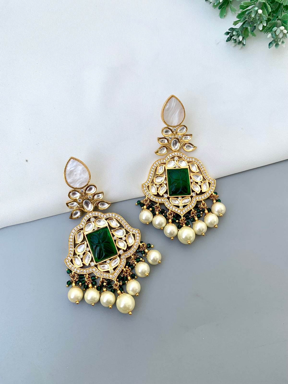 Nena handcrafted 22kt Gold plated earrings with Mother of Pearl, Polki Kundan, hand-carved Emerald and Pearls